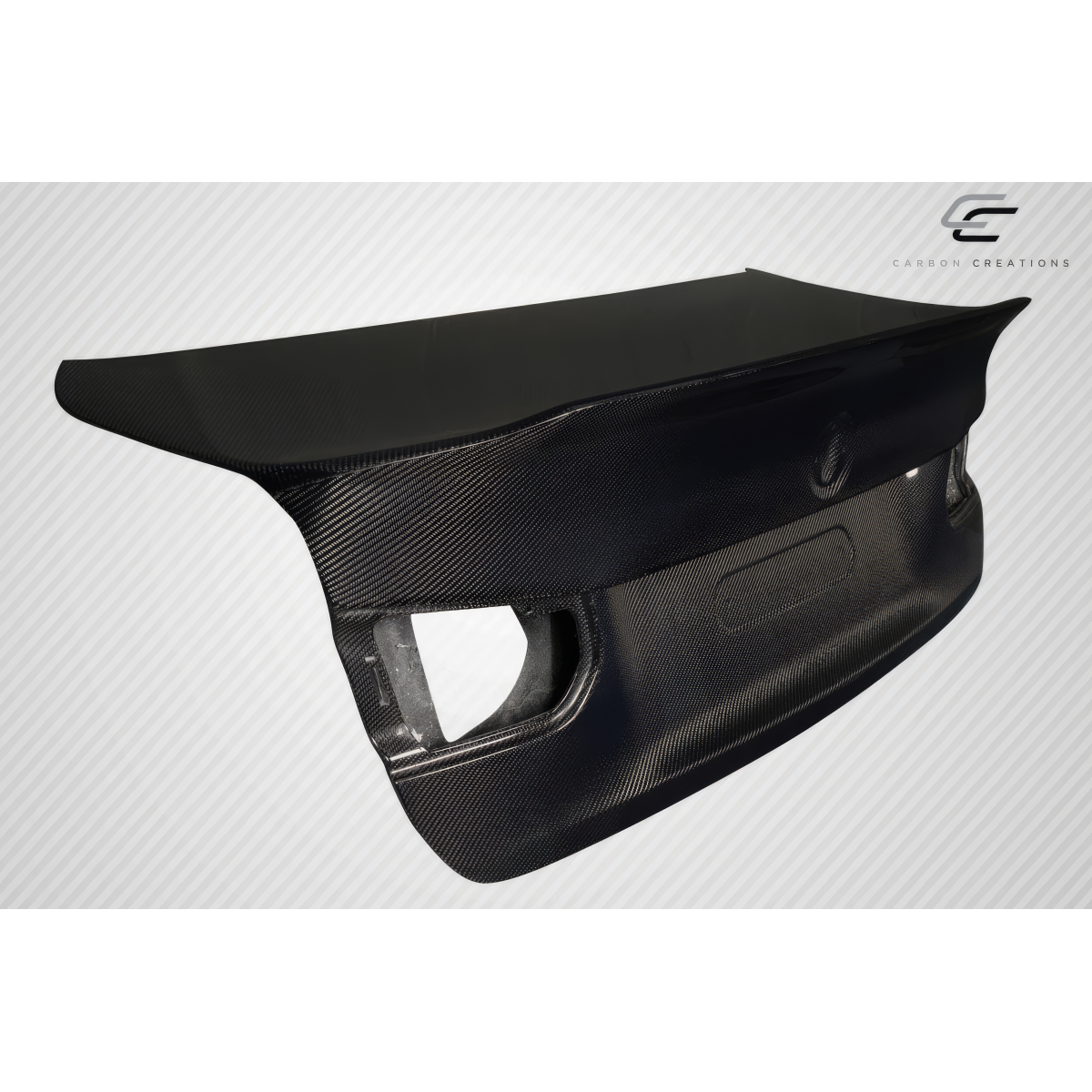 Modify your BMW 3-Series 2012 with our Exterior/Trunks - Angled view showcasing carbon fiber trunk part