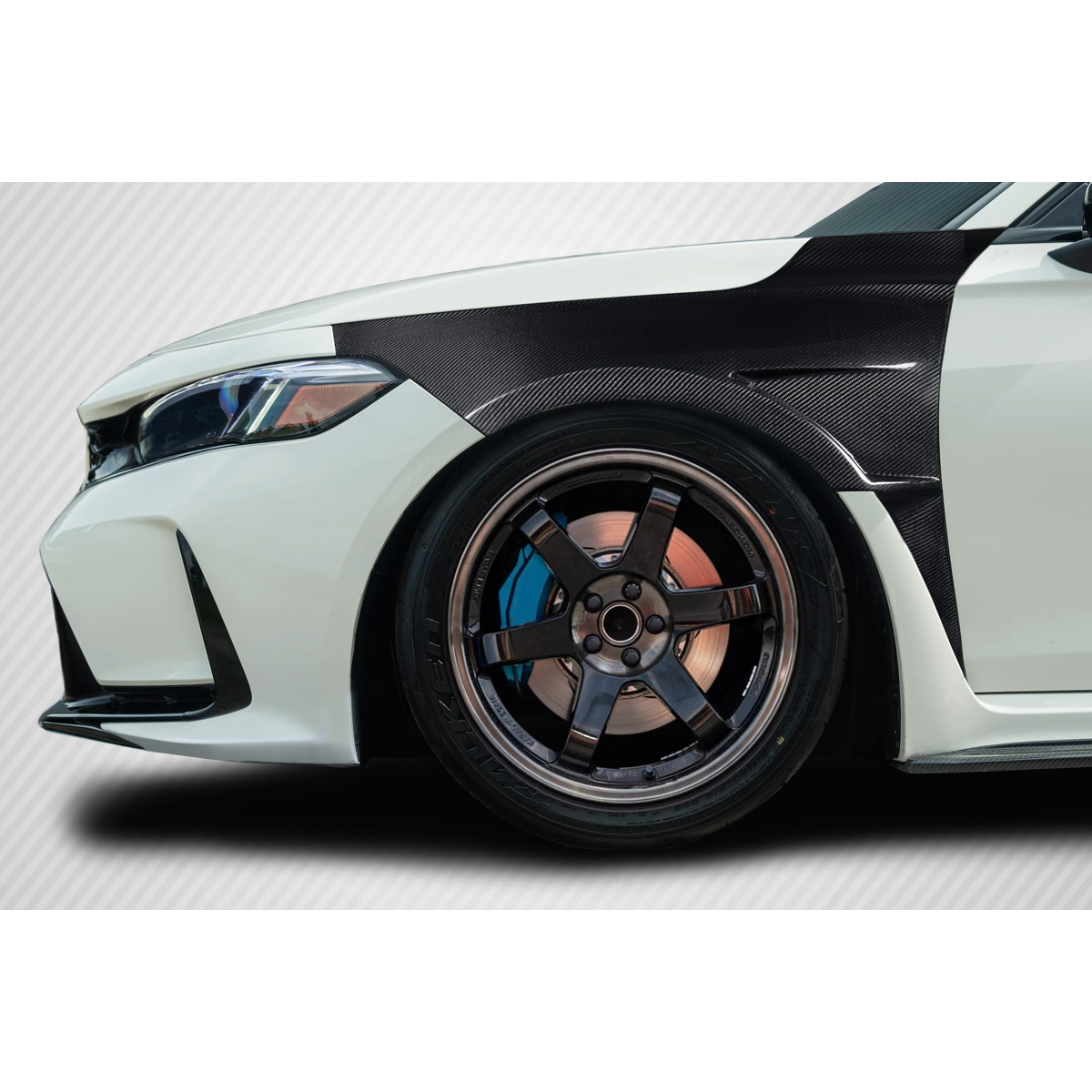 Modify your Honda Civic 2023 with our Exterior/Fenders - Angled view of the front fender and wheel