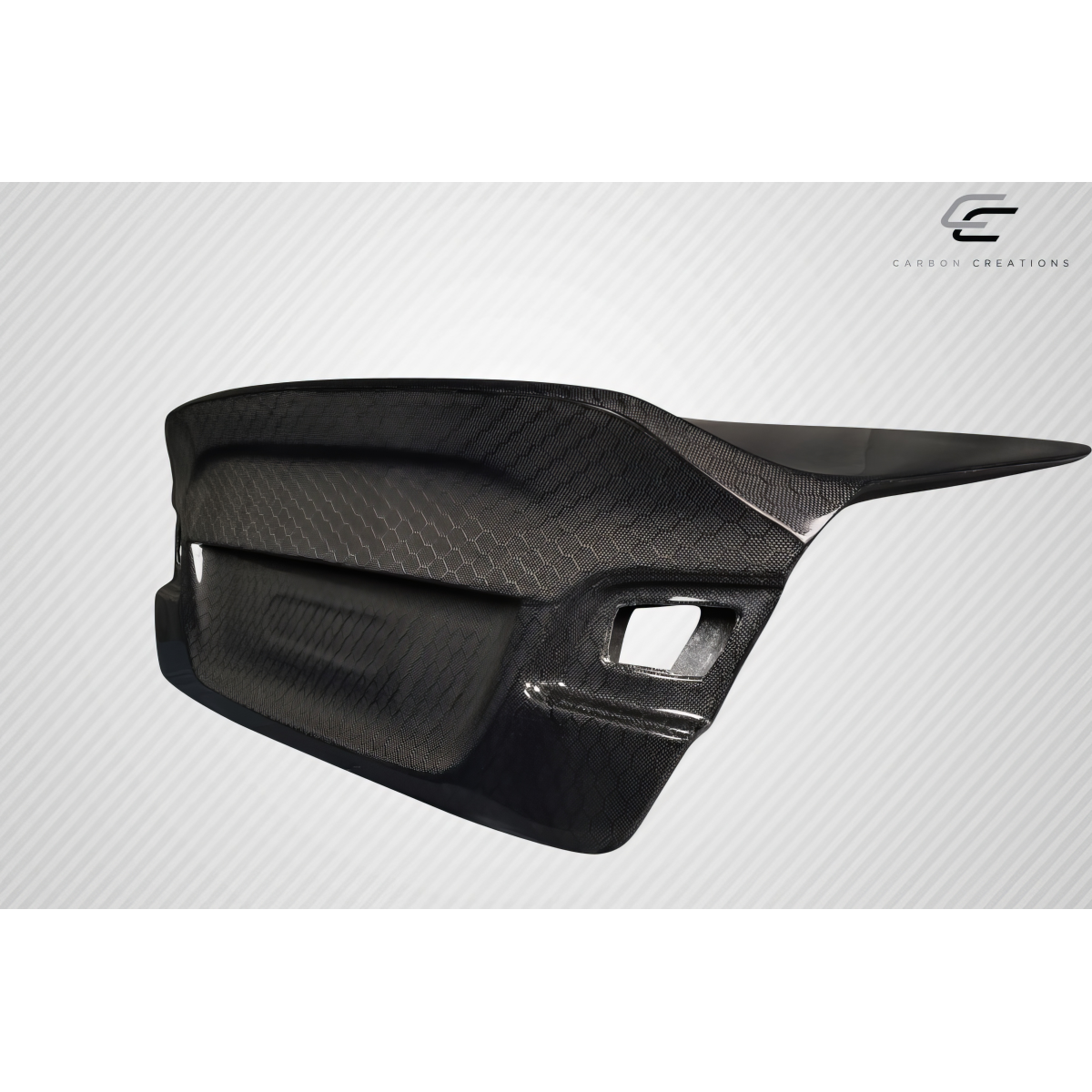 Modify your BMW 3-Series 2007 with our Exterior/Trunks - Angled view showcasing carbon fiber texture