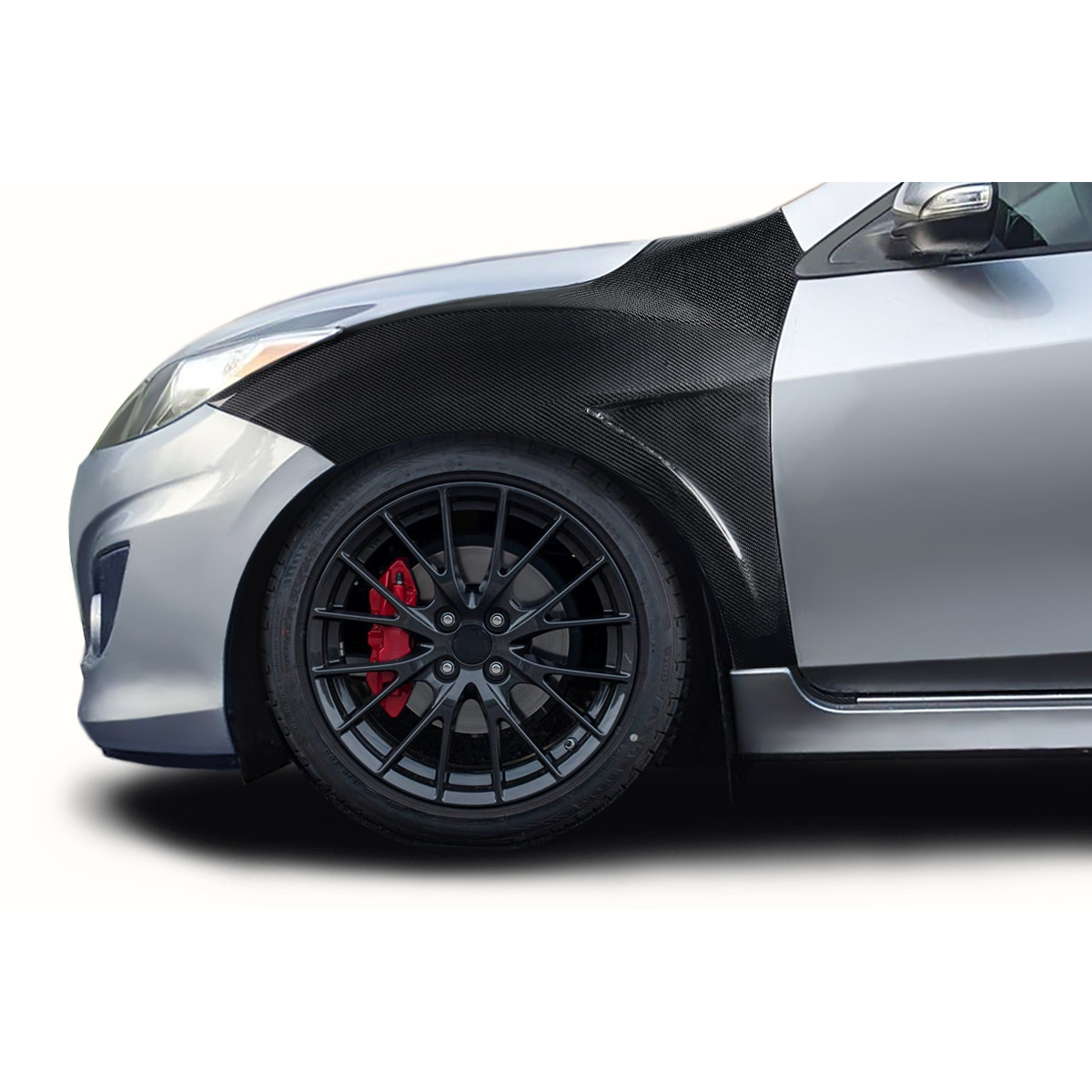 Modify your Mazda 3 2010 with our Exterior/Fenders - Front angle view of fender on silver Mazda 3