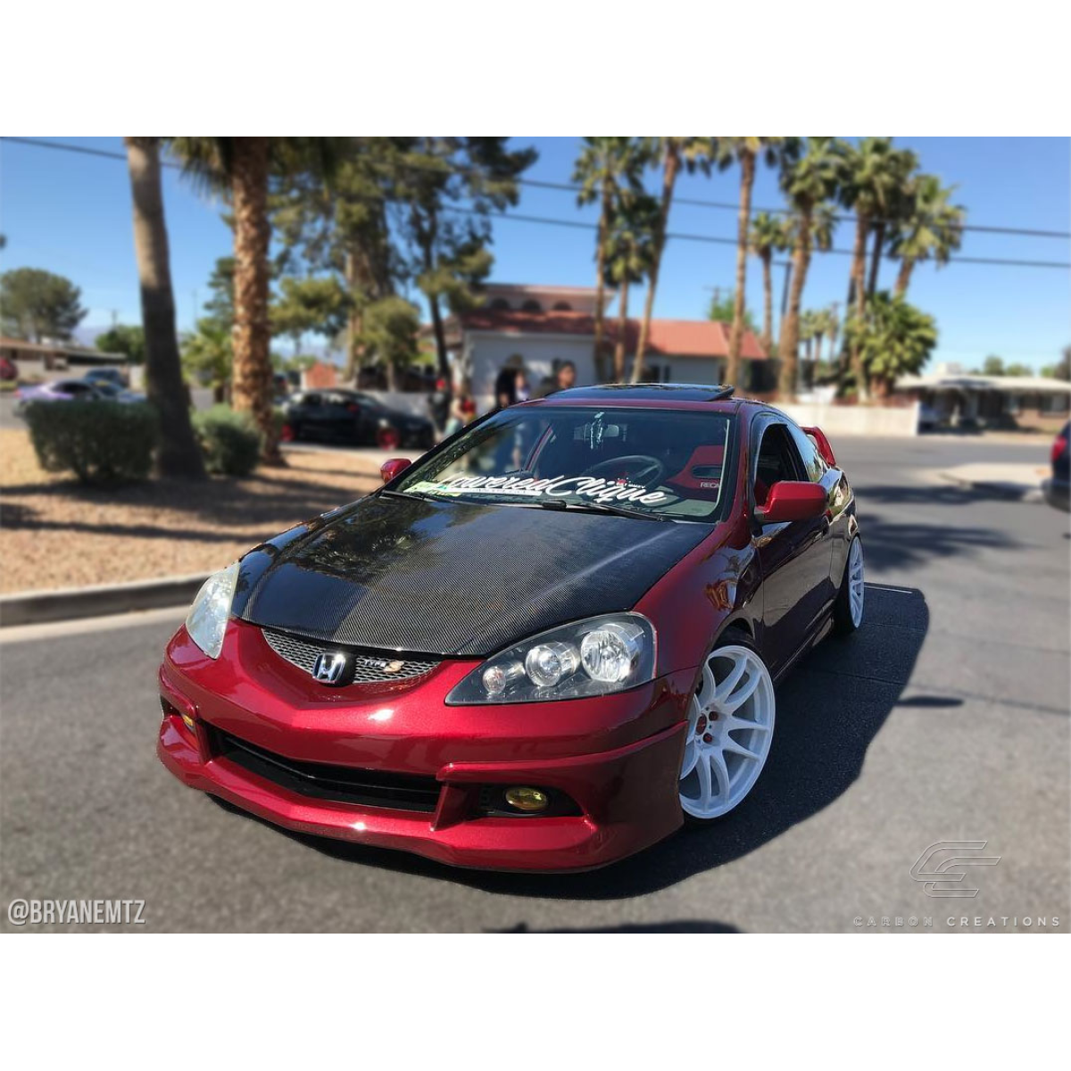 Modify your Acura RSX 2002 with our Exterior/Hoods - The image shows car at a frontal angle