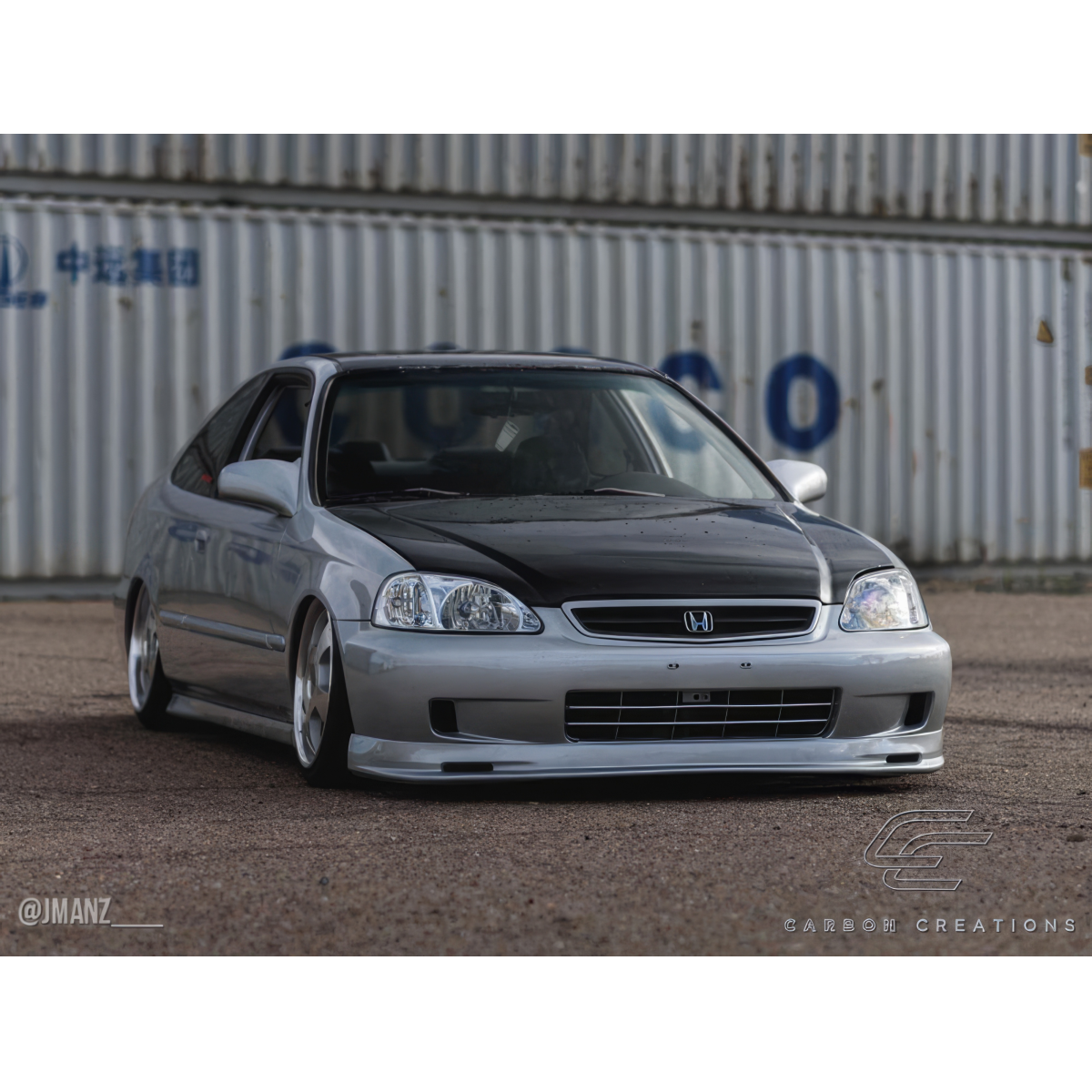 Modify your Honda Civic 1999 with our Exterior/Hoods - Front three quarter view of the car