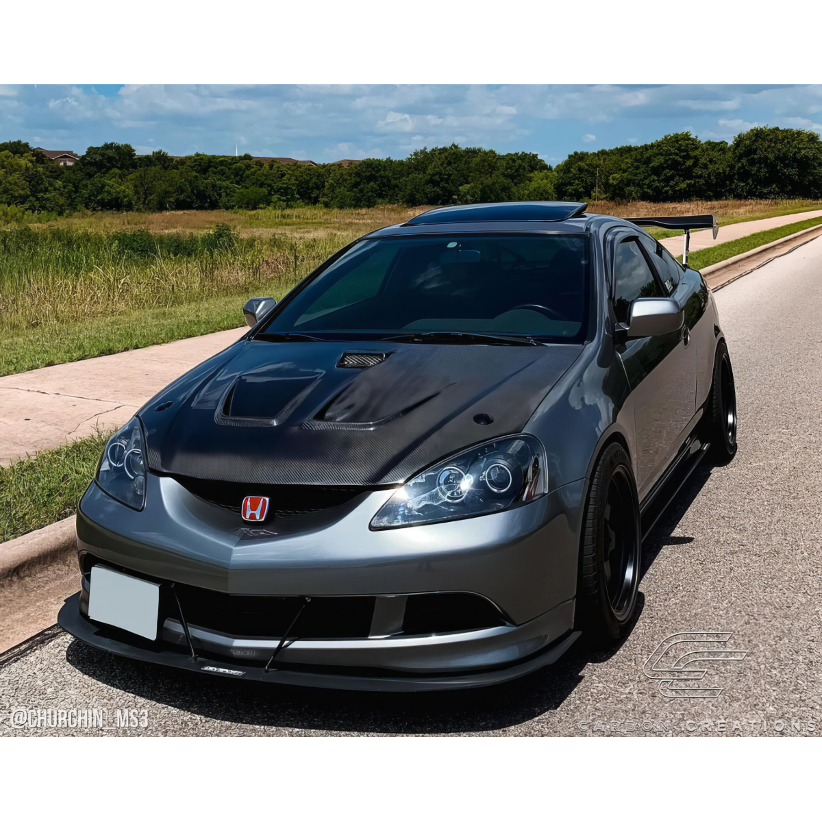 Modify your Acura RSX 2002 with our Exterior/Hoods - Front angle view of vehicle showing hood clearly