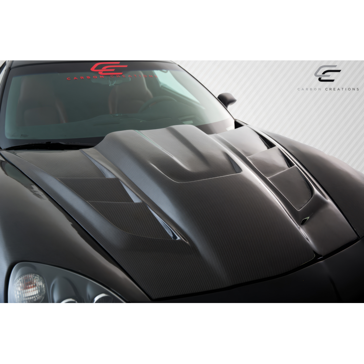 Modify your Chevrolet Corvette 2005 with our Exterior/Hoods - Viewed from a slight top angle