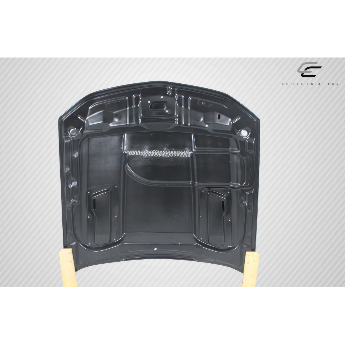 Modify your Ford Mustang 2010 with our Exterior/Hoods - The part is viewed from the front at a slight angle