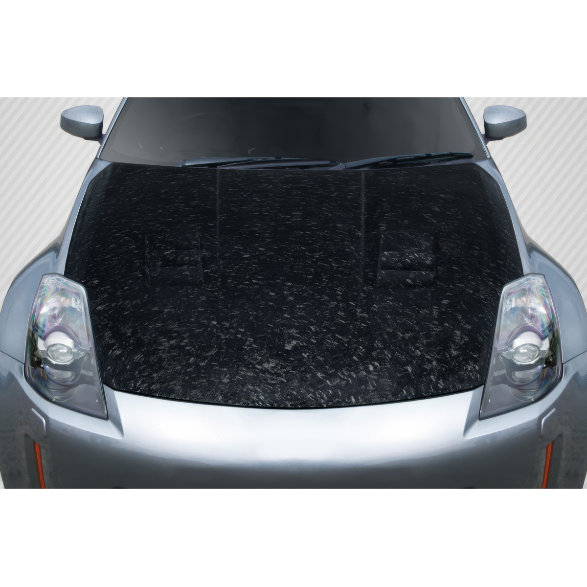 Modify your Nissan 350Z 2003 with our Exterior/Hoods - Front top angle of hood showing carbon fiber finish