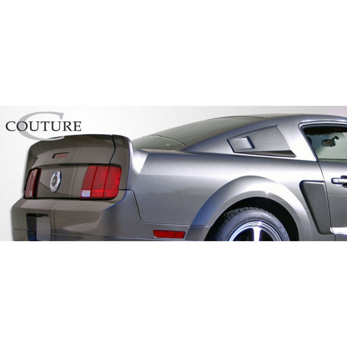 Modify your Ford Mustang 2005 with our Exterior/Wings - Rear three quarter angle showing trunk lid spoiler