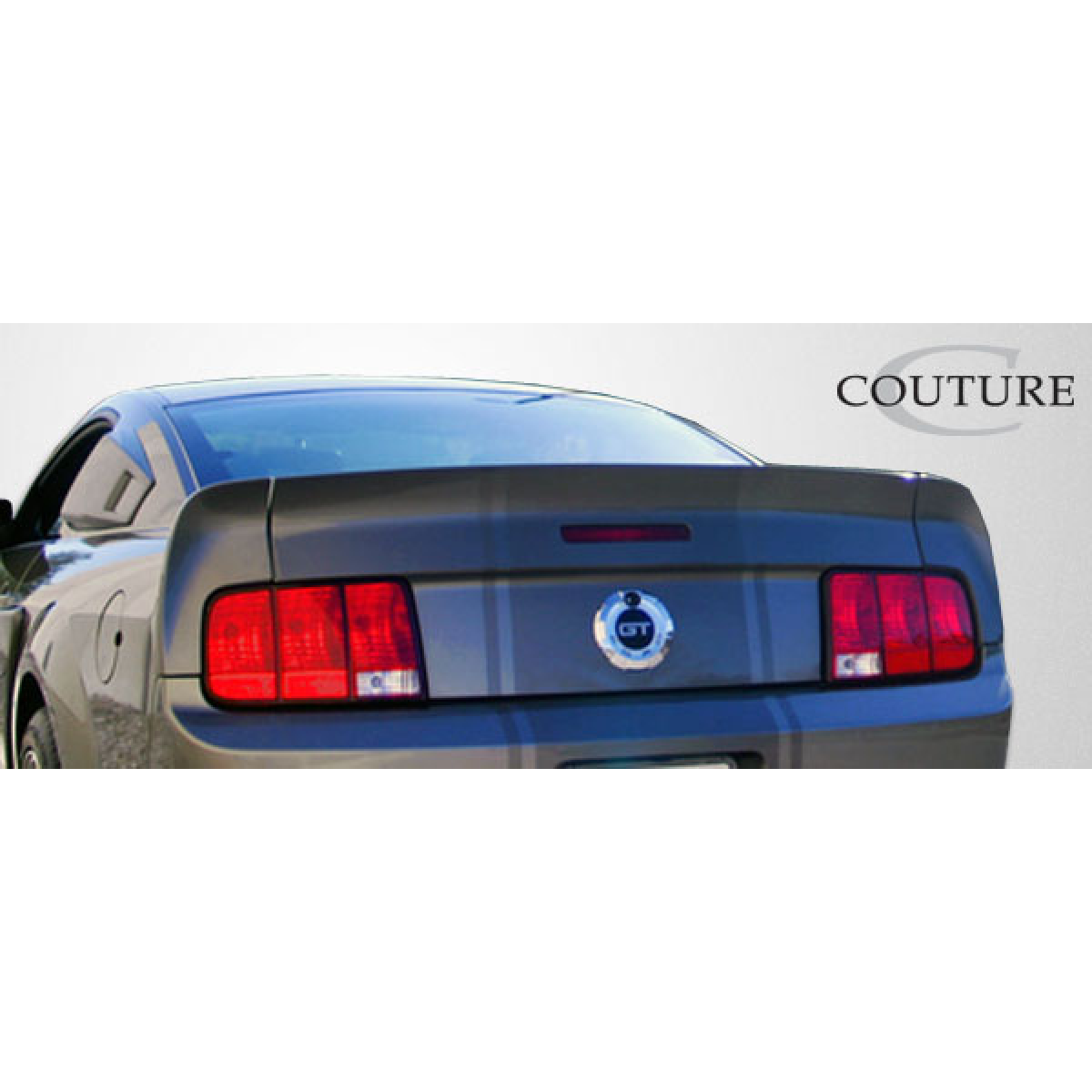 Modify your Ford Mustang 2005 with our Exterior/Wings - Rear view angle showing trunk lid and wing