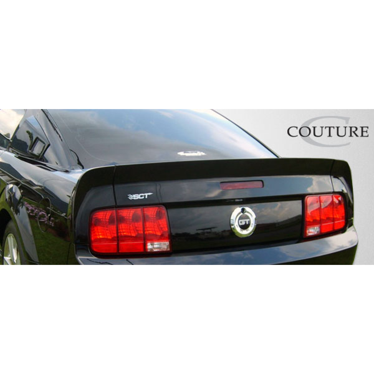 Modify your Ford Mustang 2005 with our Exterior/Wings - Rear view at a slight angle from the right