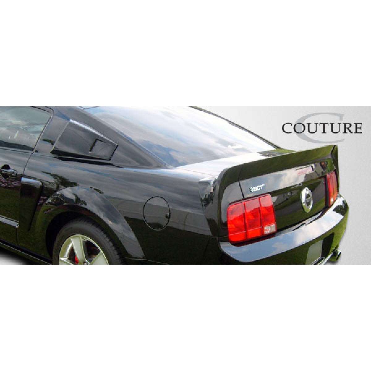 Modify your Ford Mustang 2005 with our Exterior/Wings - Side angle view of rear trunk lid spoiler