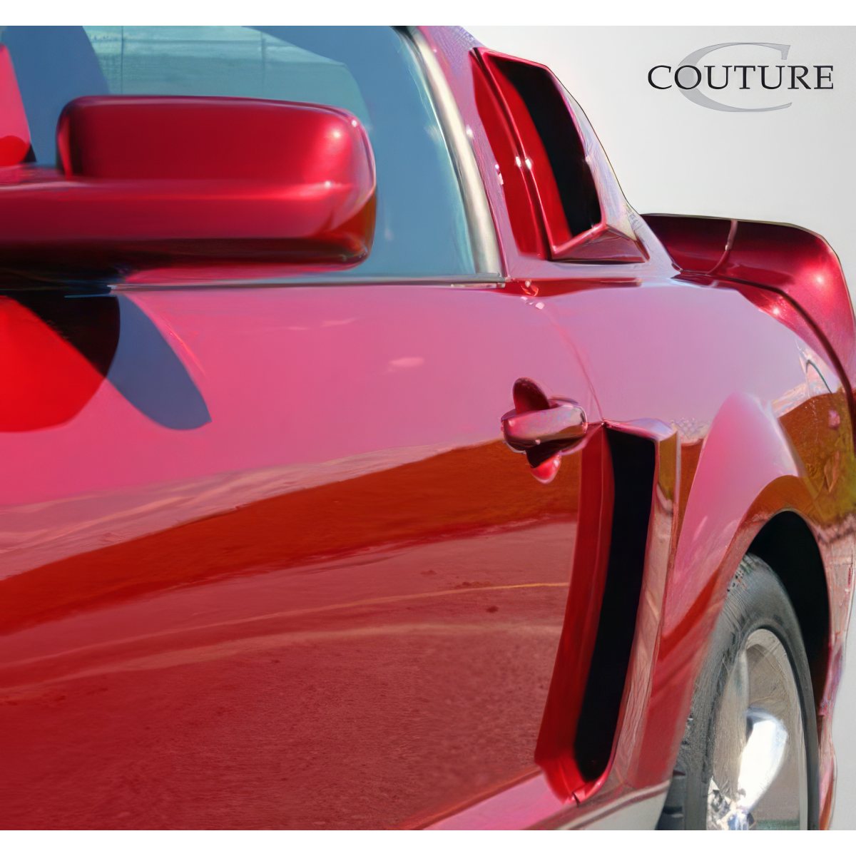 Modify your Ford Mustang 2005 with our Exterior/Scoops - Angle showing side view of car part