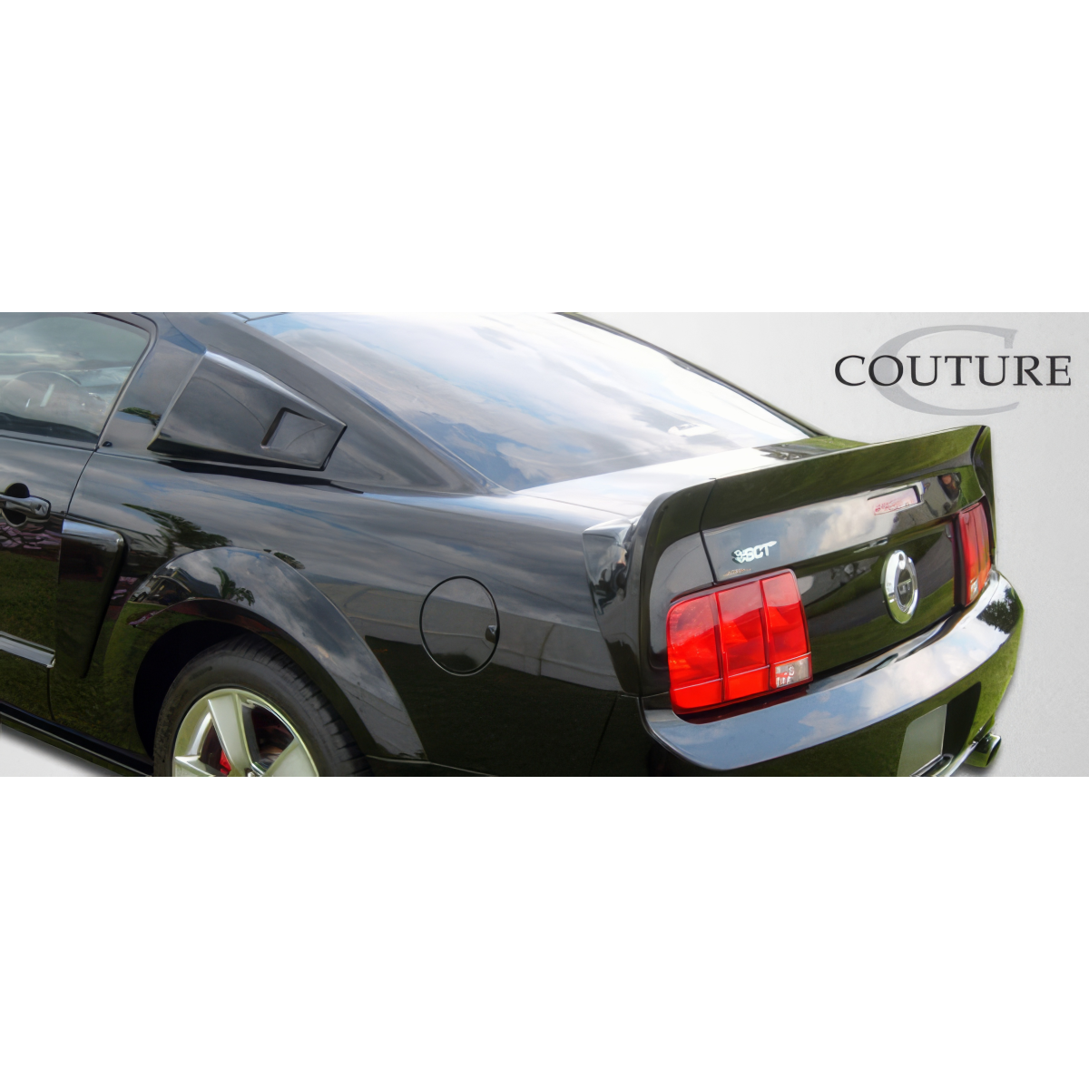 Modify your Ford Mustang 2005 with our Exterior/Scoops - Angle shows rear side view of vehicle