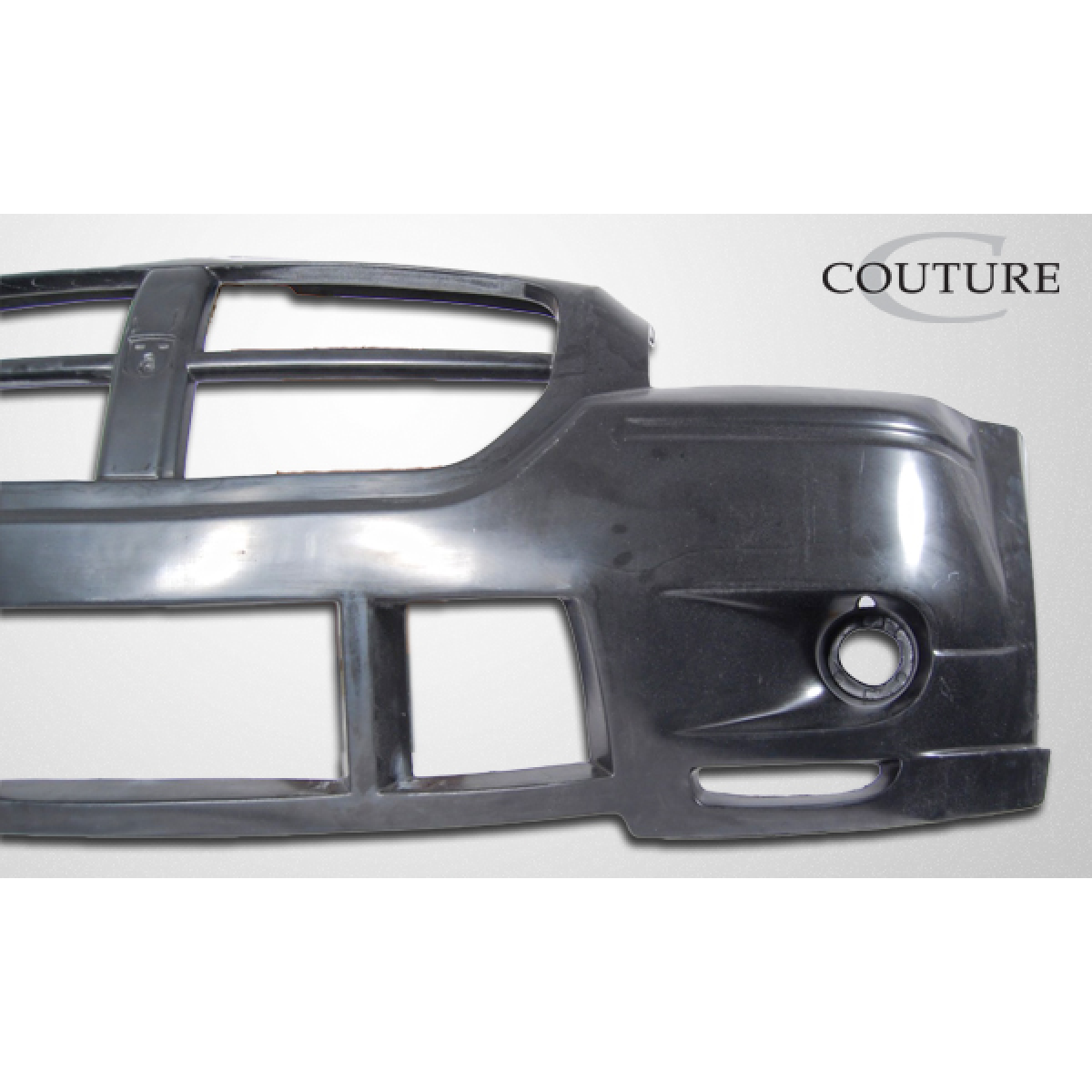 Modify your Dodge Magnum 2005 with our Exterior/Front Bumpers or Lips - Front view of the bumper slightly angled to the right