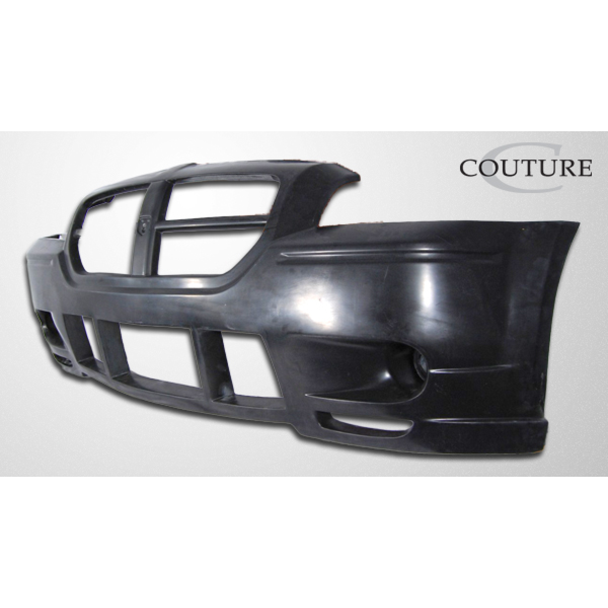 Modify your Dodge Magnum 2005 with our Exterior/Front Bumpers or Lips - The part is shown at a slight angle from the side