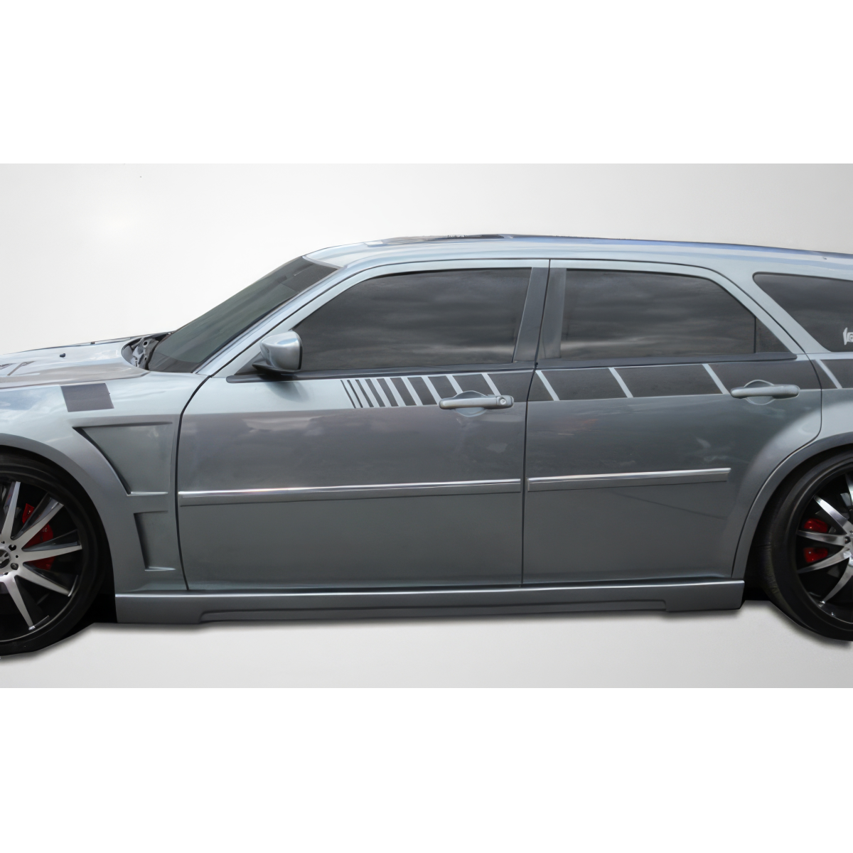 Modify your Chrysler 300 2005 with our Exterior/Side Skirts - Side view of a Chrysler 300 at a slight angle