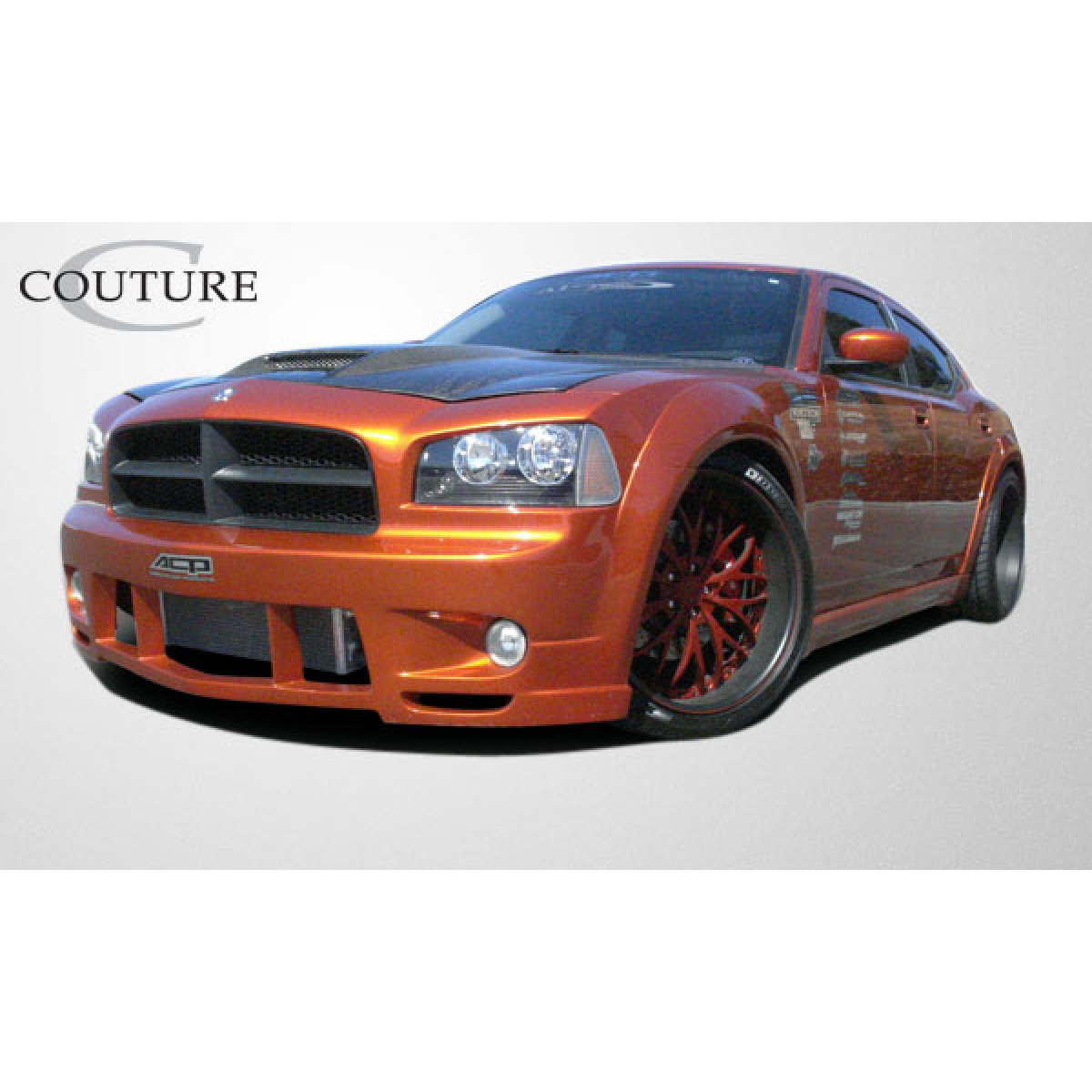 Modify your Dodge Charger 2006 with our Exterior/Complete Body Kits - Viewed from a low front angle showcasing the bumper