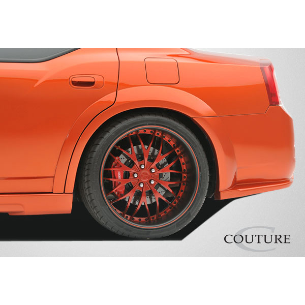 Modify your Dodge Charger 2006 with our Exterior/Complete Body Kits - Side angle view of rear wheel and fender flare