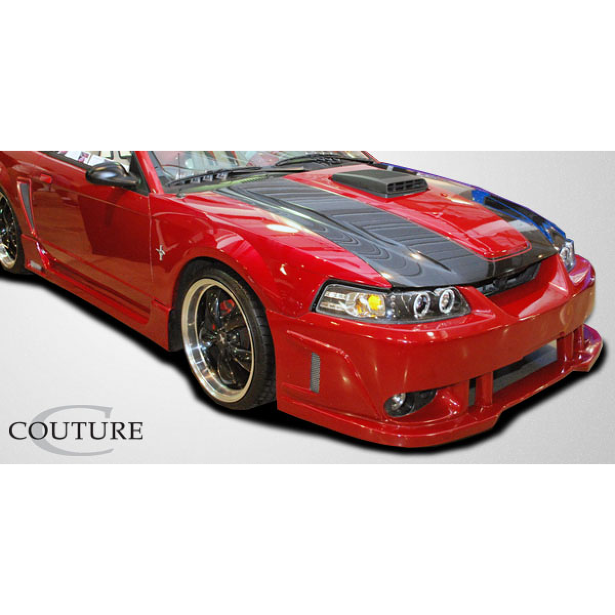 Modify your Ford Mustang 1999 with our Exterior/Front Bumpers or Lips - Front angle view of red Ford Mustang bumper