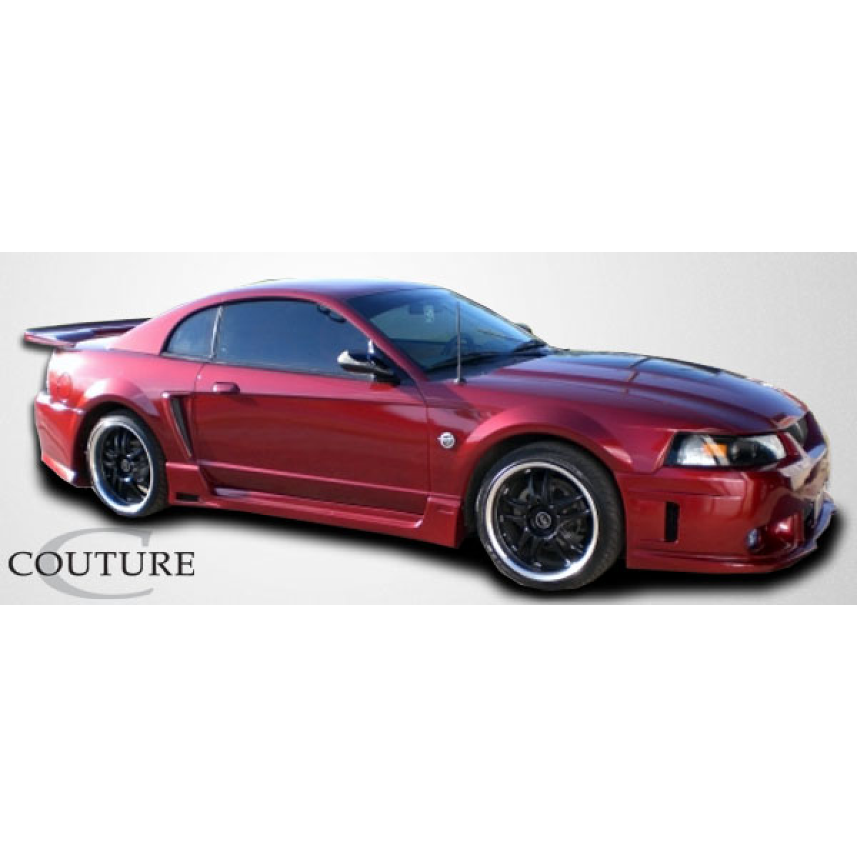 Modify your Ford Mustang 1999 with our Exterior/Front Bumpers or Lips - Image shows car from a side angle