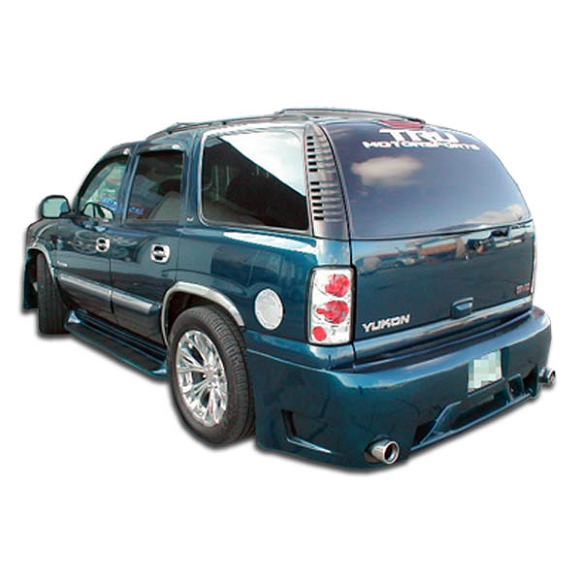 Modify your GMC Yukon 2000 with our Exterior/Complete Body Kits - Rear angle view of vehicle showing bumper design