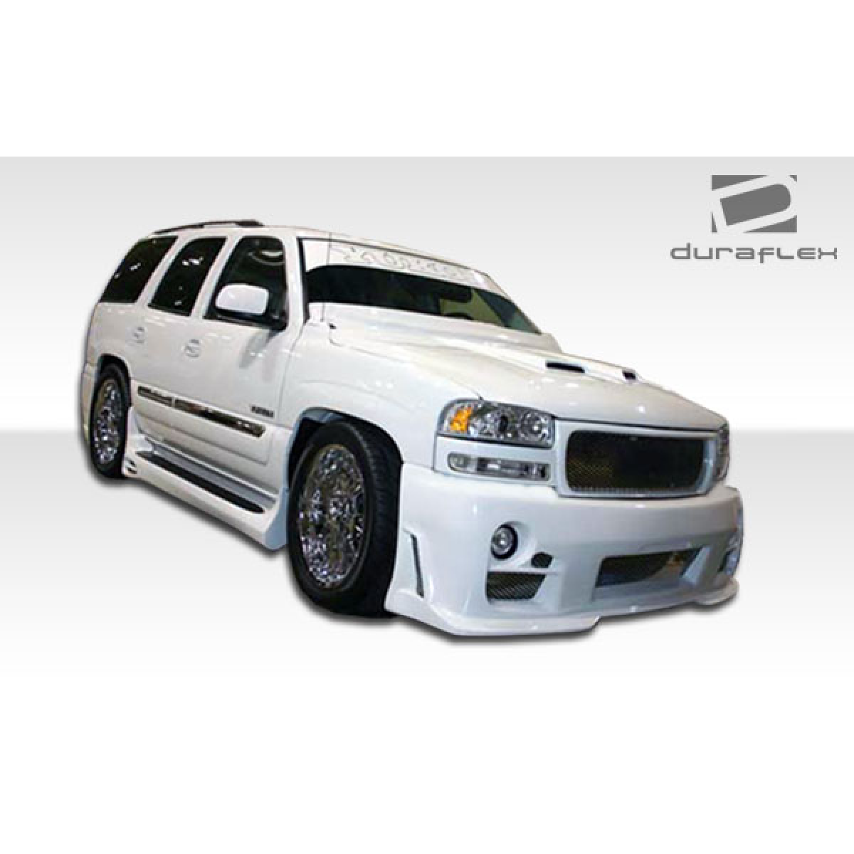 Modify your GMC Yukon 2000 with our Exterior/Complete Body Kits - Image shows vehicle from a slight front angle