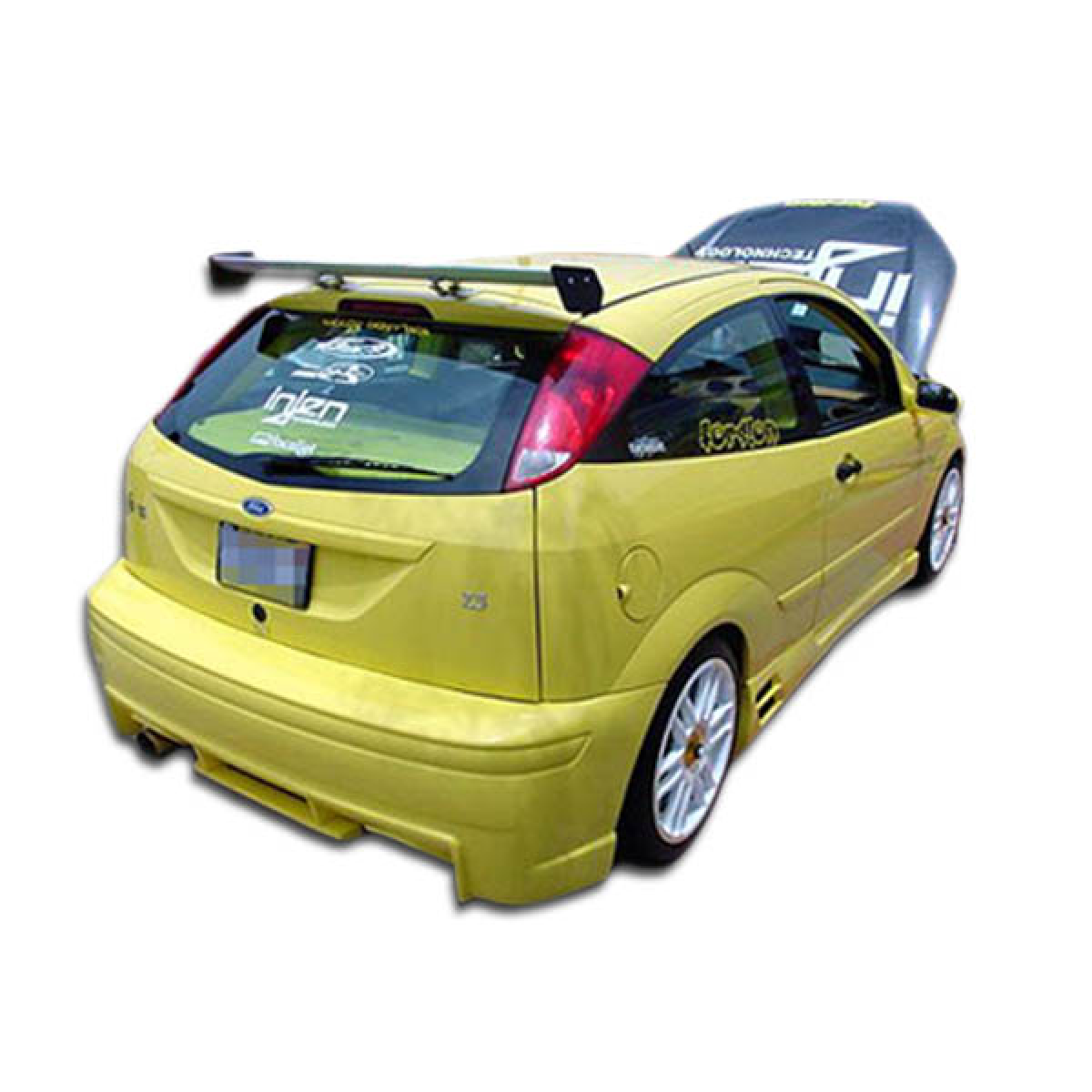 Modify your Ford Focus 2000 with our Exterior/Complete Body Kits - View of rear at slightly angled perspective