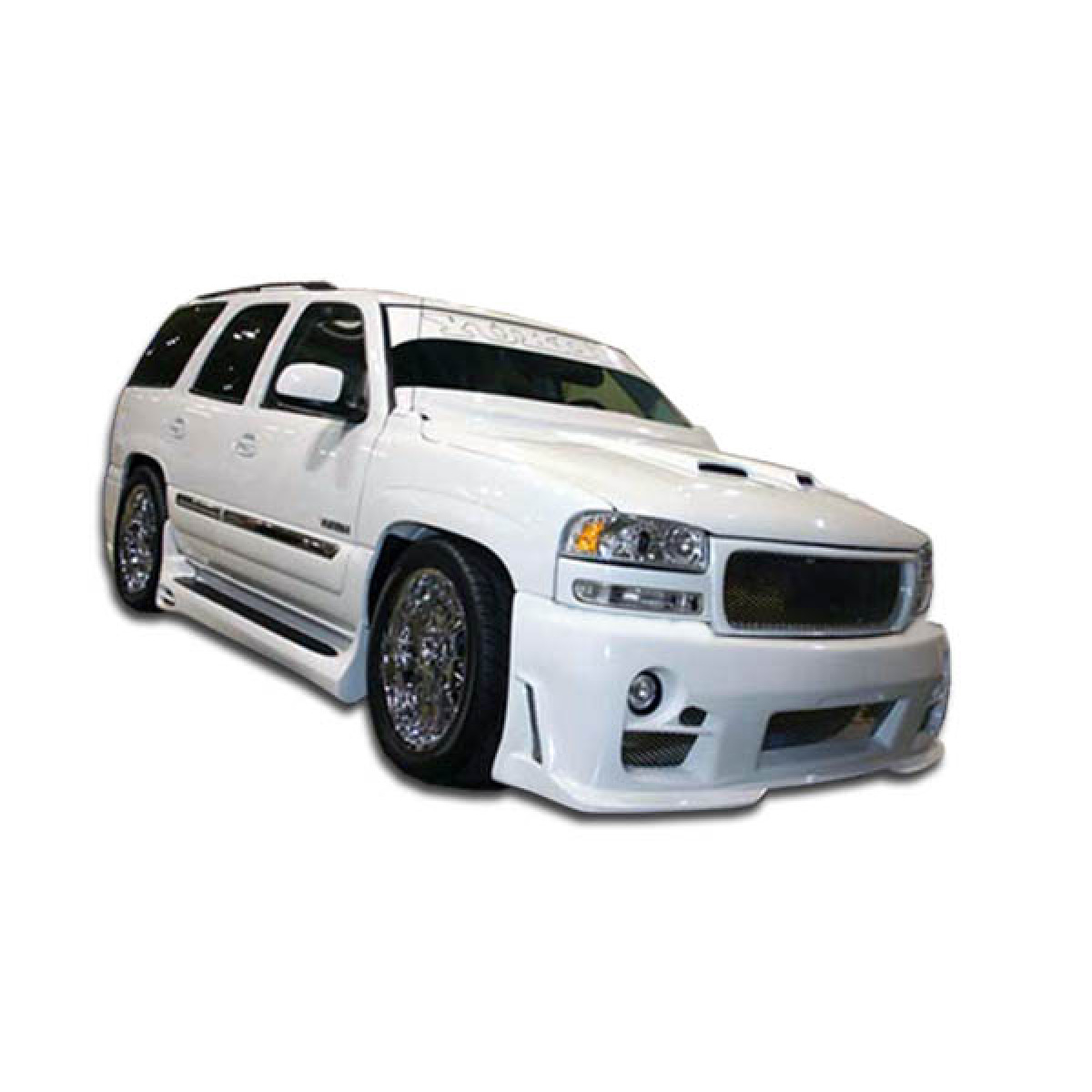 Modify your GMC Yukon 2000 with our Exterior/Front Bumpers or Lips - Front angle view of a modified GMC Yukon