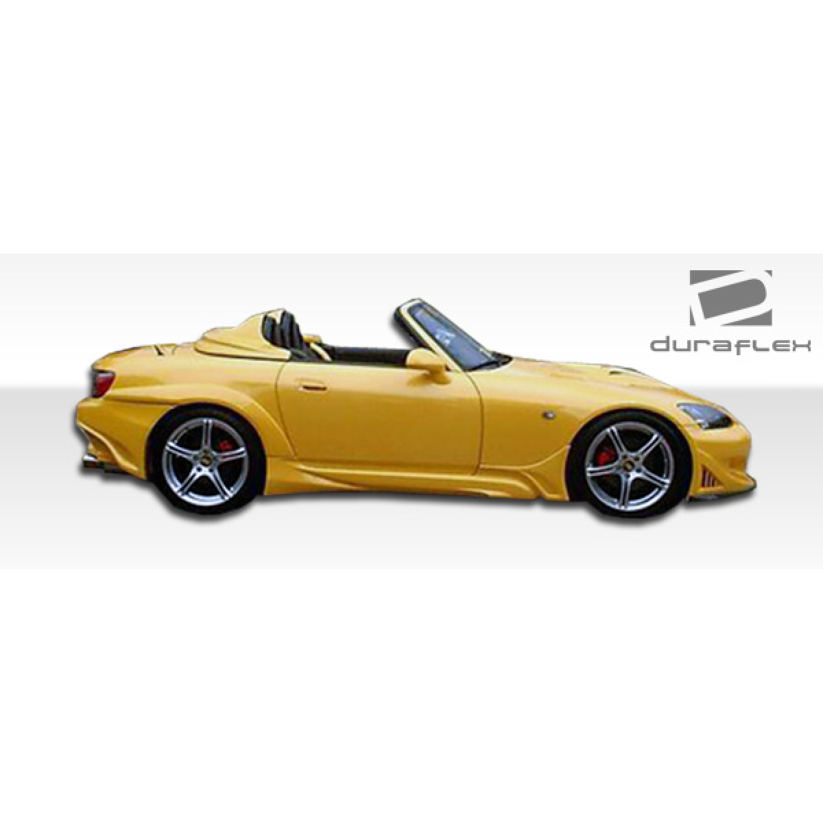 Modify your Honda S2000 2000 with our Exterior/Fenders - Side angle view of fender flares on car