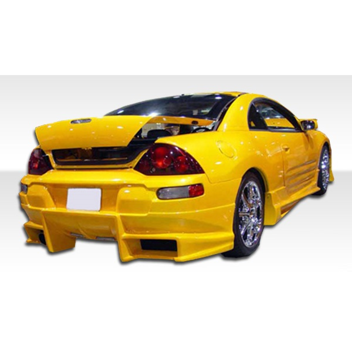 Modify your Mitsubishi Eclipse 2000 with our Exterior/Complete Body Kits - Rear view at a slight angle focused on bumper