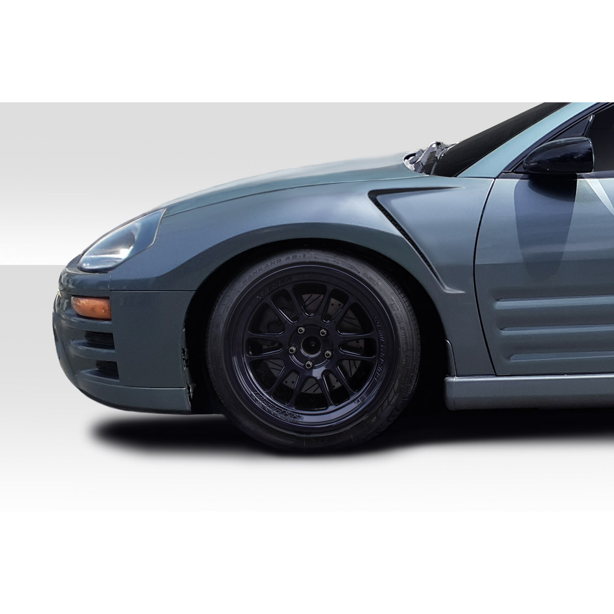 Modify your Mitsubishi Eclipse 2000 with our Exterior/Fenders - The image shows a side view of the fender at slight angle