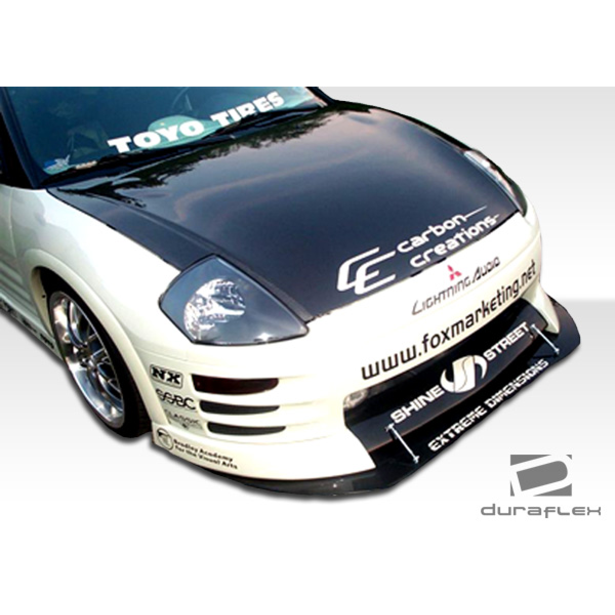 Modify your Mitsubishi Eclipse 2003 with our Exterior/Complete Body Kits - Front angled view of car body kit part