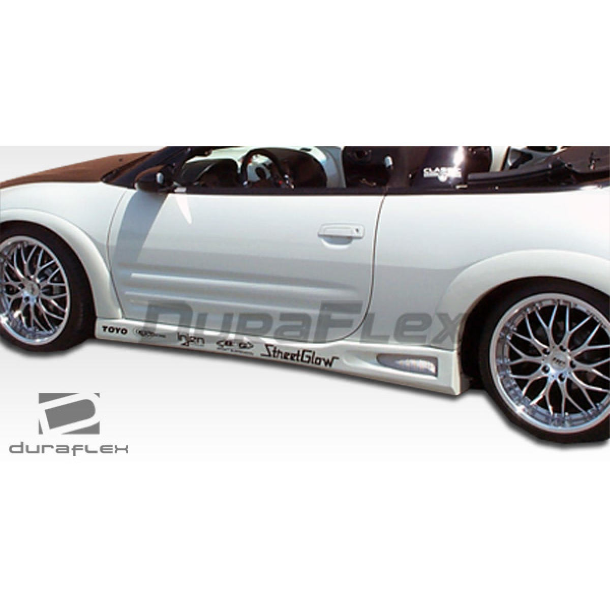 Modify your Mitsubishi Eclipse 2003 with our Exterior/Complete Body Kits - Side angle view of vehicle fender flares