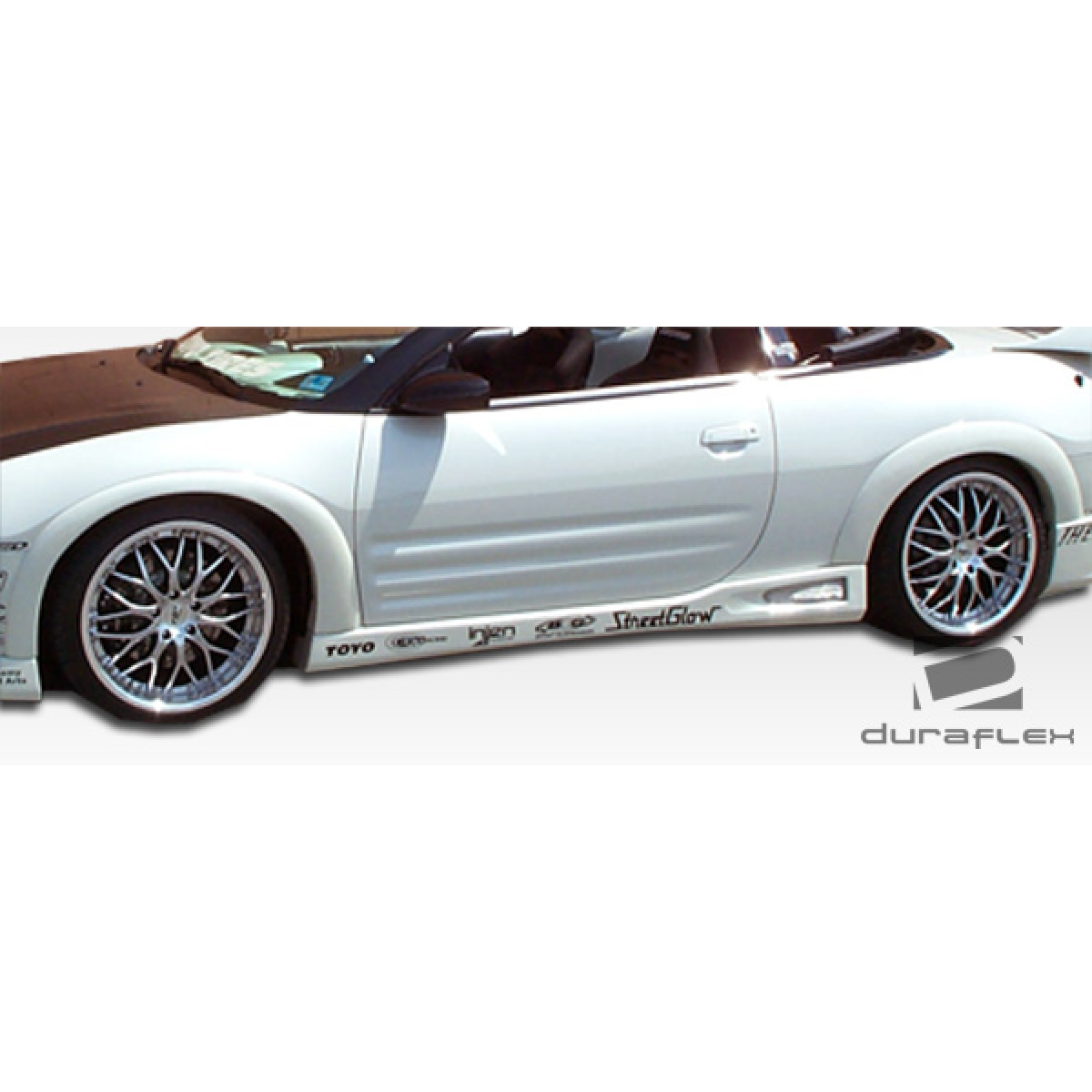 Modify your Mitsubishi Eclipse 2003 with our Exterior/Complete Body Kits - Side view at an angle highlighting the fender flares