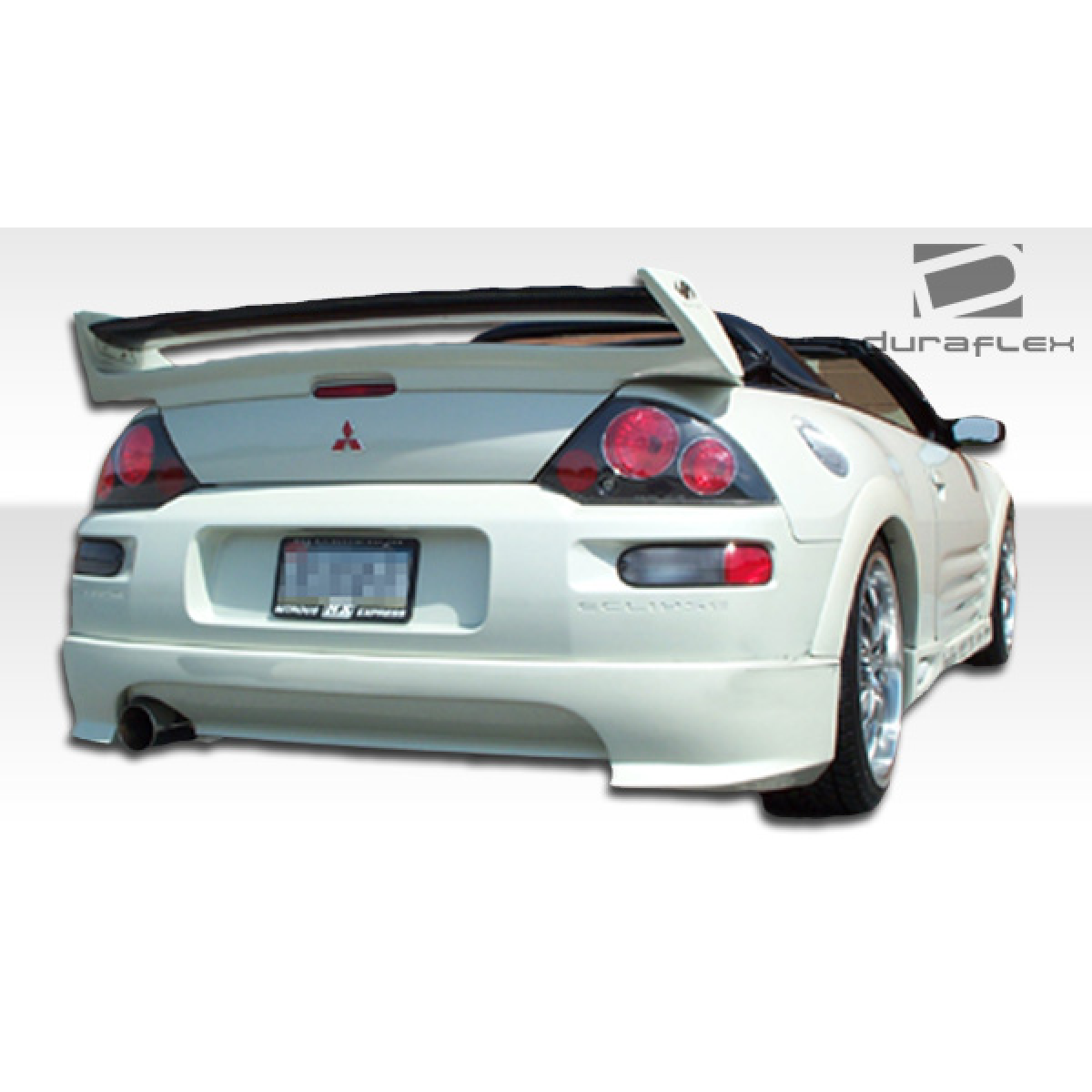 Modify your Mitsubishi Eclipse 2000 with our Exterior/Rear Bumpers or Lips - Rear angle view of the vehicle part