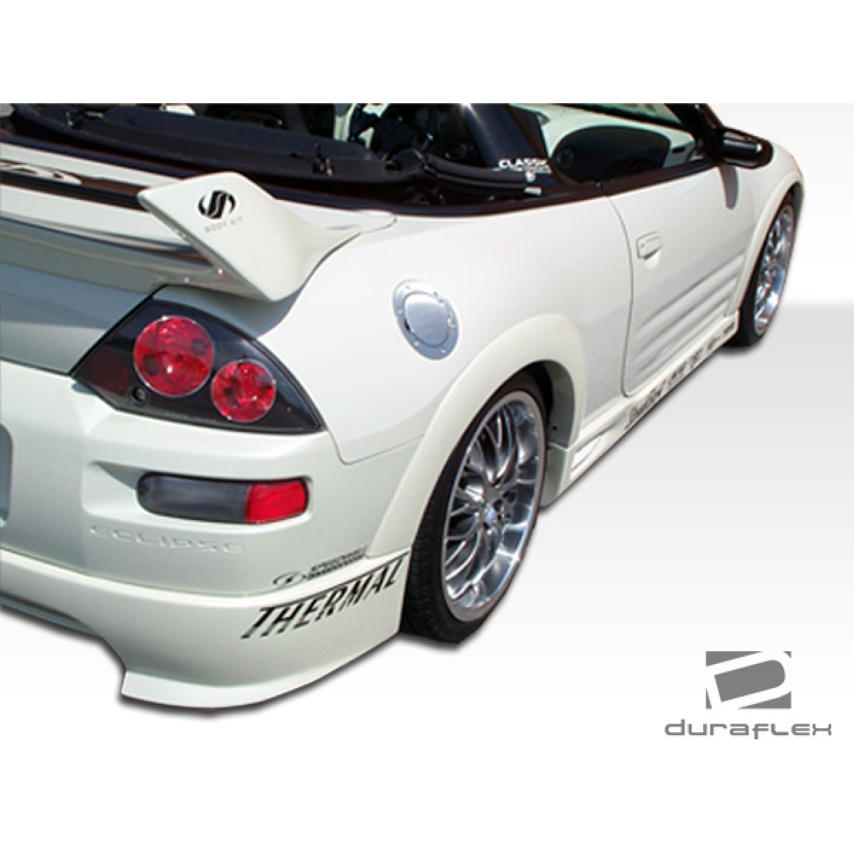 Modify your Mitsubishi Eclipse 2000 with our Exterior/Rear Bumpers or Lips - Rear angle view showcasing the bumper lip part