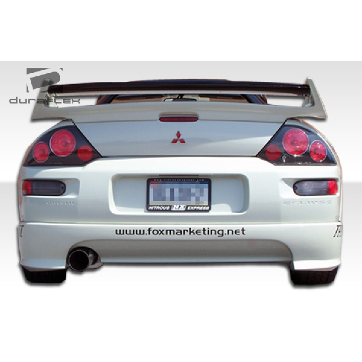 Modify your Mitsubishi Eclipse 2000 with our Exterior/Rear Bumpers or Lips - Rear view from a slight angle