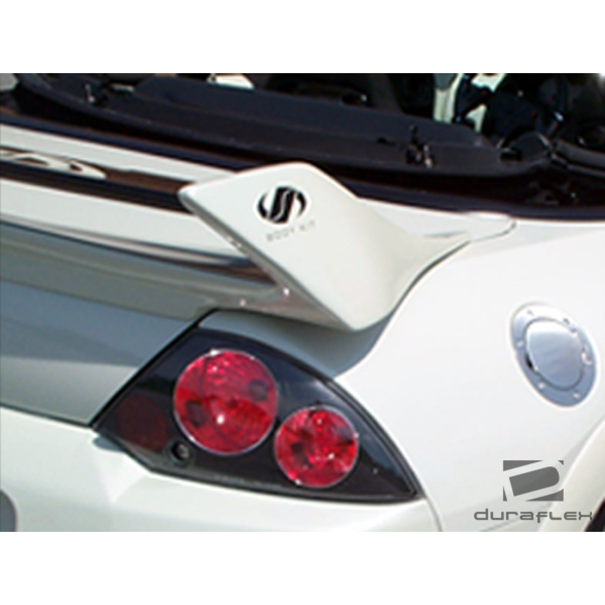 Modify your Mitsubishi Eclipse 2000 with our Exterior/Wings - Rear angle showcasing the wing attachment