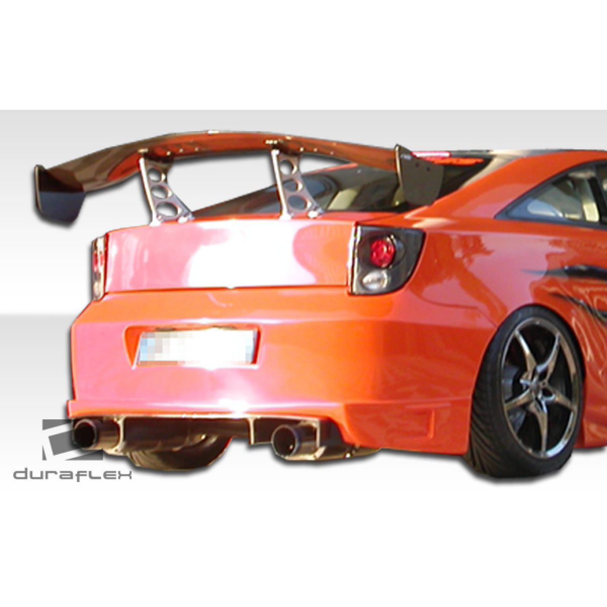 Modify your Toyota Celica 2000 with our Exterior/Rear Bumpers or Lips - Part seen from a slight rear angle