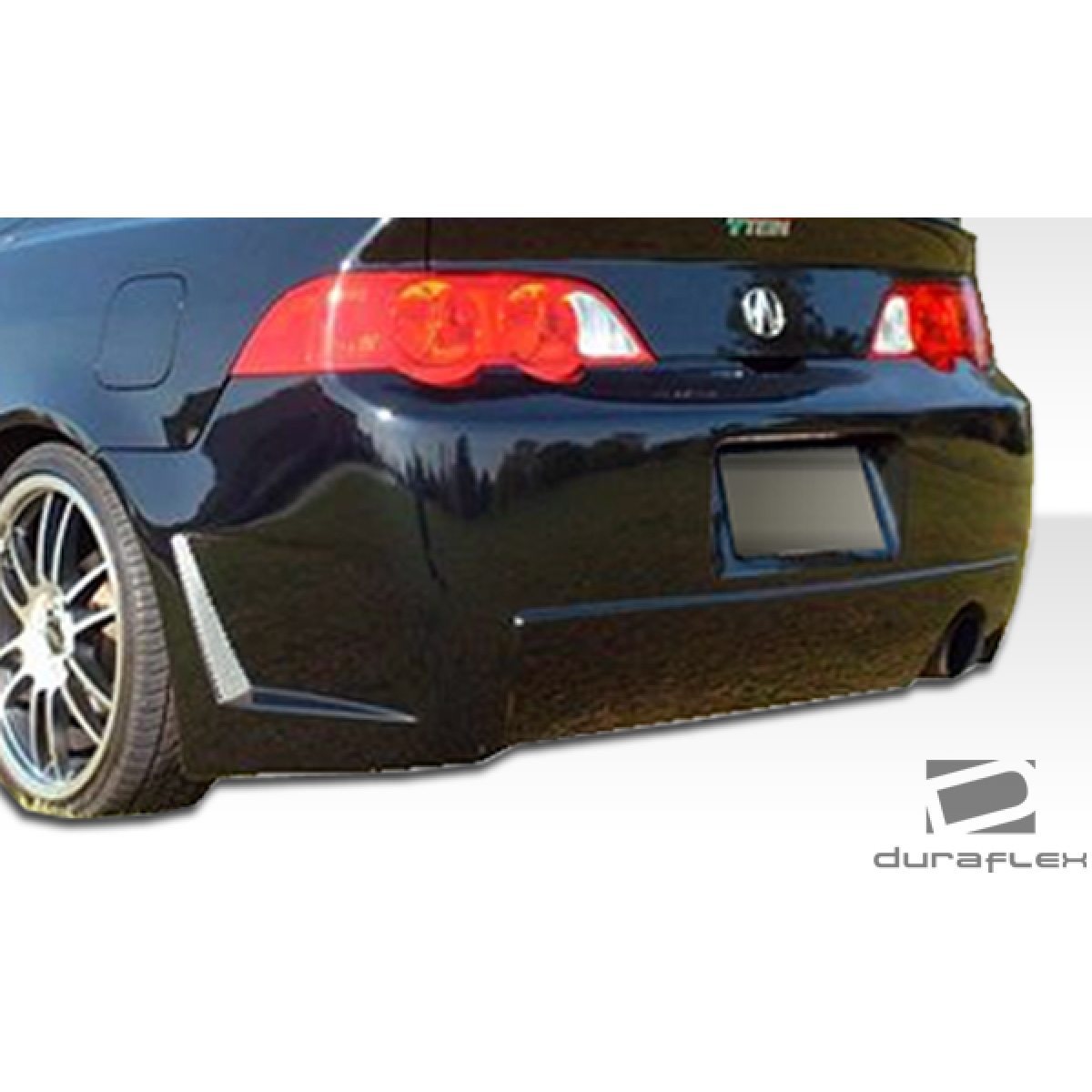 Modify your Acura RSX 2002 with our Exterior/Rear Bumpers or Lips - Rear angle view showcasing bumper design