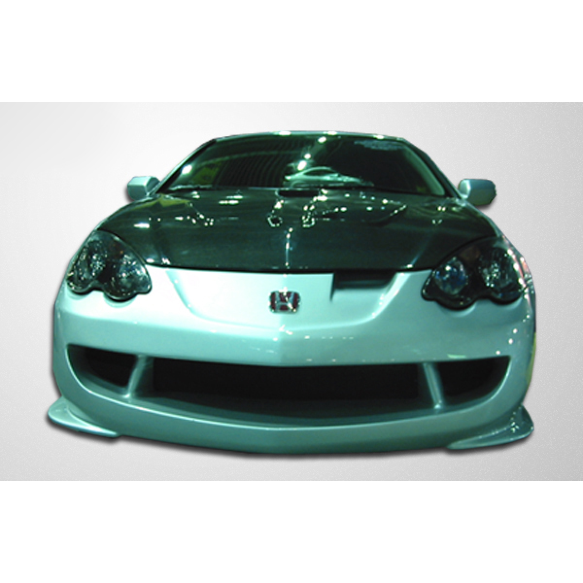 Modify your Acura RSX 2002 with our Exterior/Complete Body Kits - Frontal view of the car at a low angle