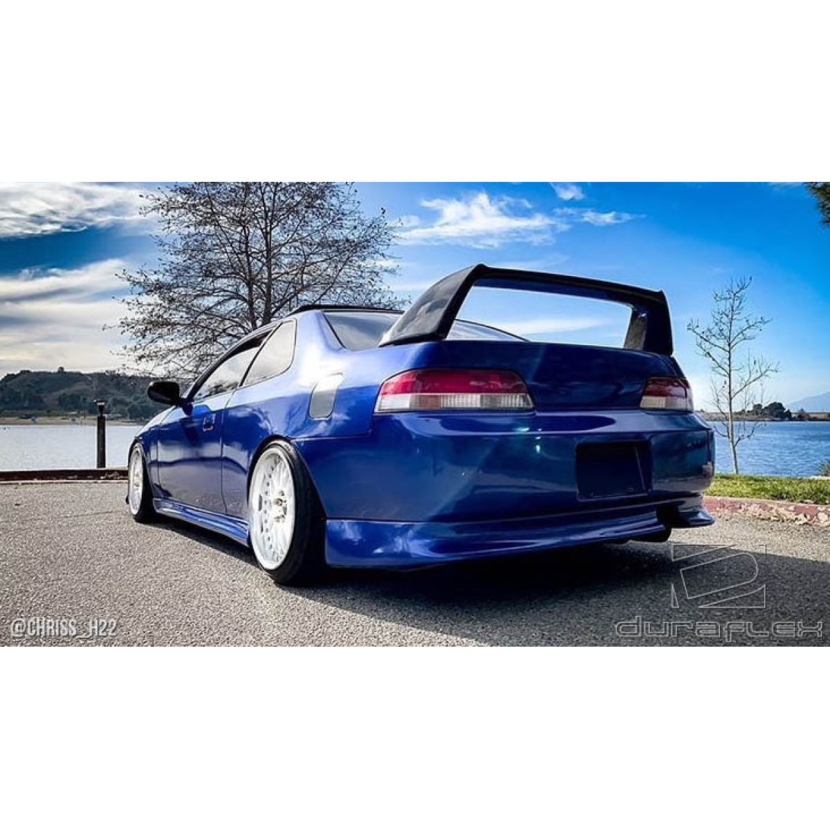 Modify your Acura RSX 2002 with our Exterior/Wings - Rear angle showcasing the wing and body kit features