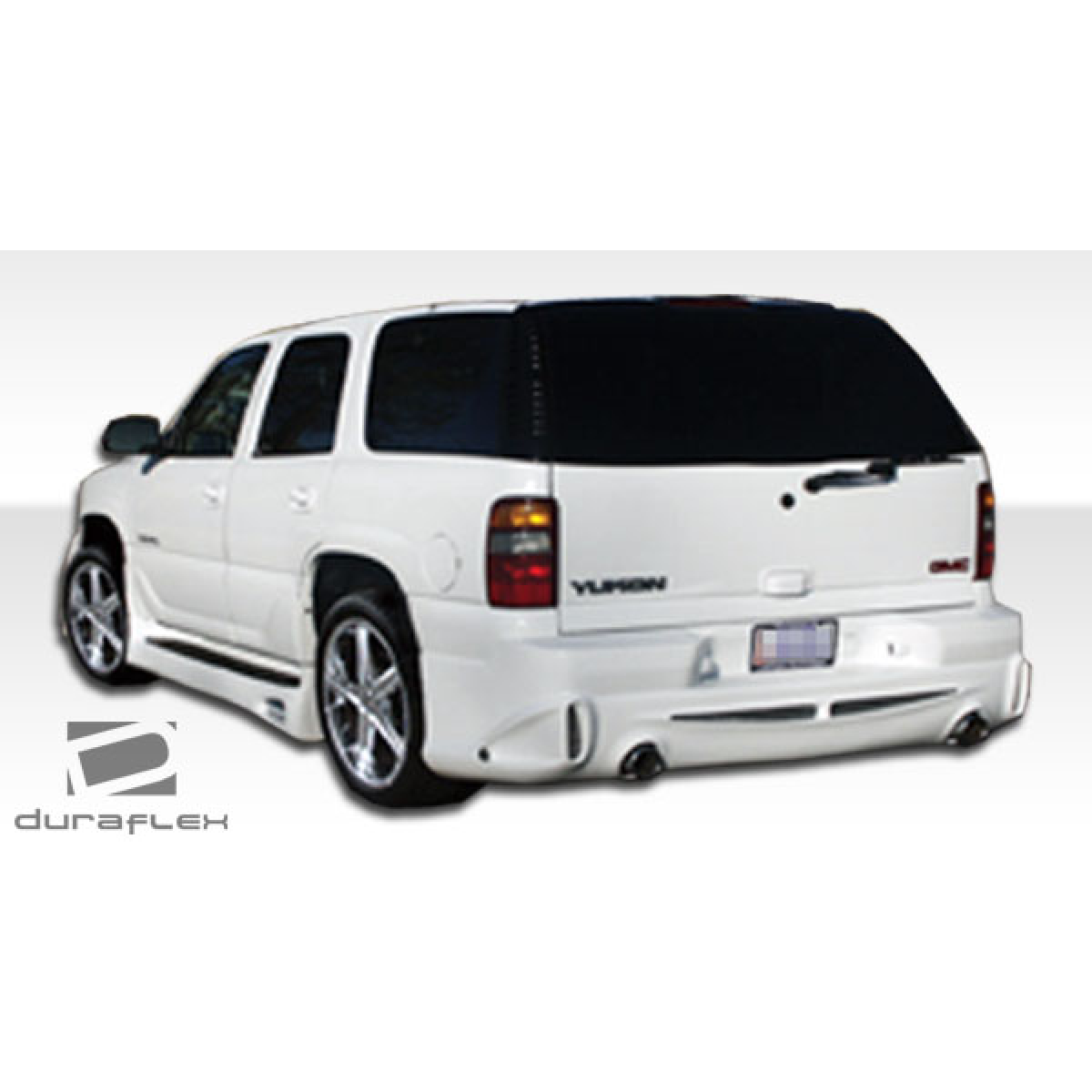 Modify your GMC Yukon Denali XL 2001 with our Exterior/Rear Bumpers or Lips - Rear view angle showing rear bumper design