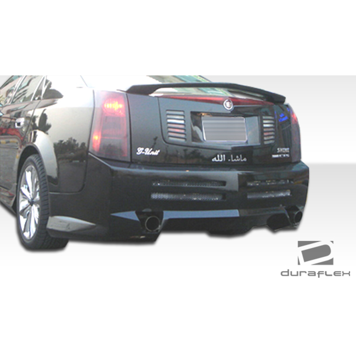 Modify your Cadillac CTS 2003 with our Exterior/Complete Body Kits - Rear angle view of the vehicle part