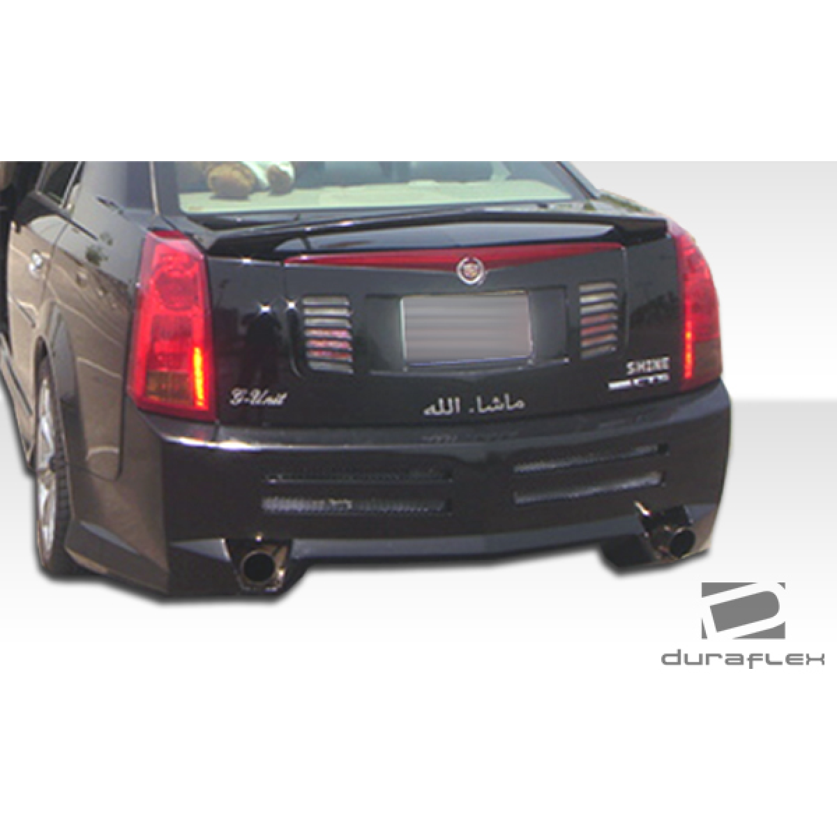 Modify your Cadillac CTS 2003 with our Exterior/Complete Body Kits - Viewed from a slight rear angle