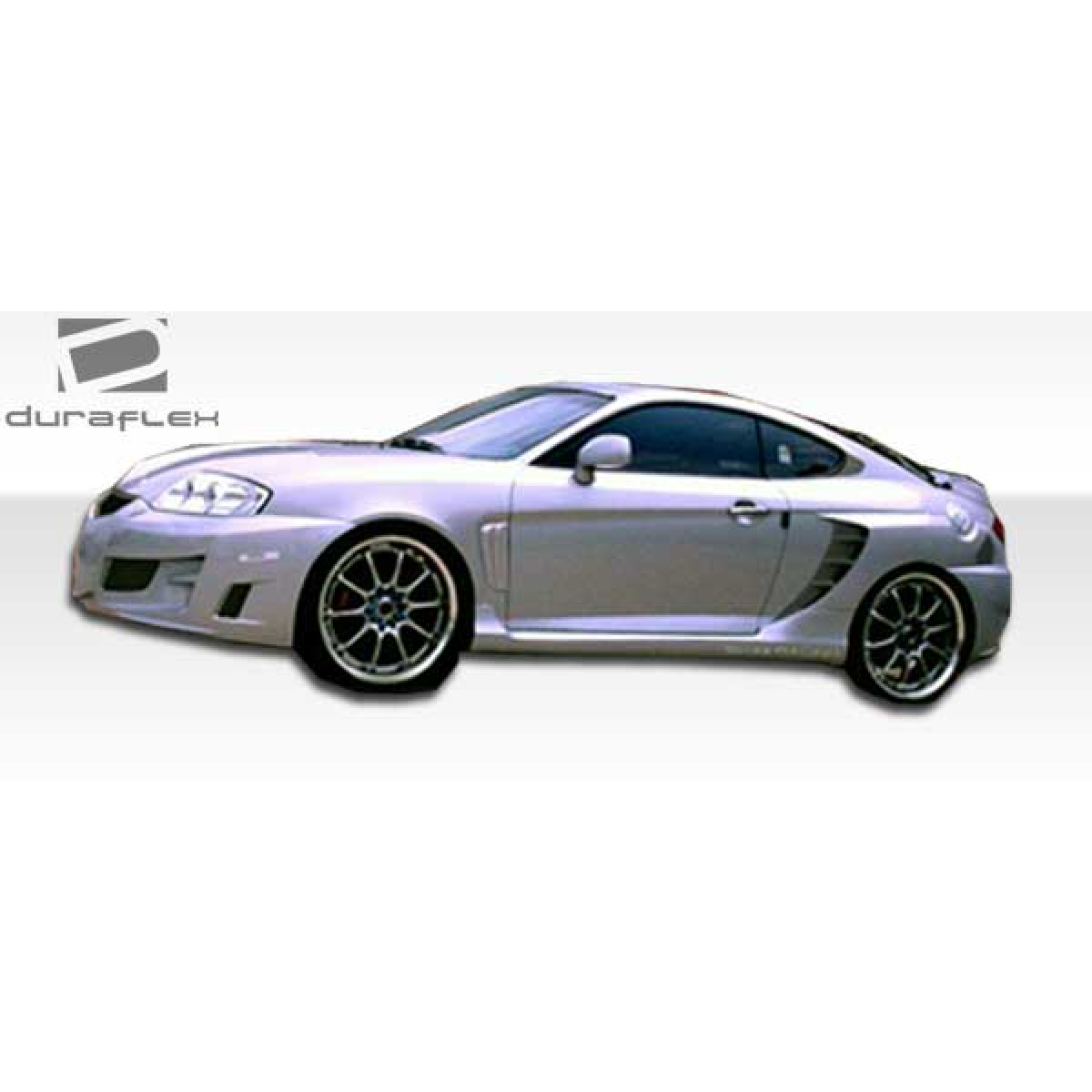 Modify your Hyundai Tiburon 2003 with our Exterior/Front Bumpers or Lips - Side view at a slight angle from front