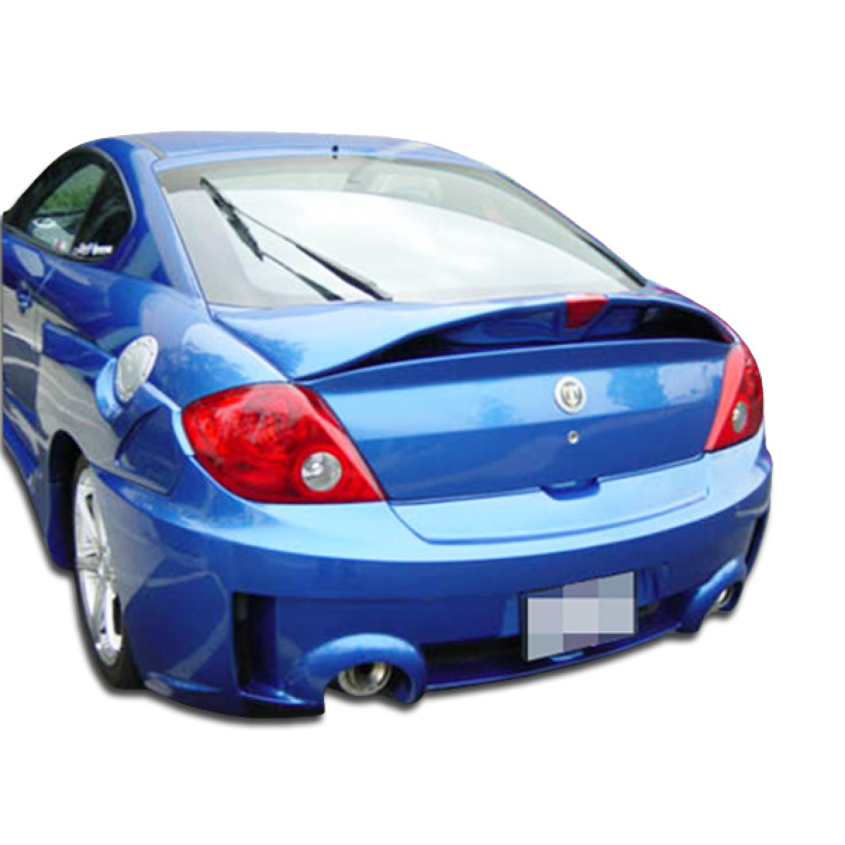 Modify your Hyundai Tiburon 2003 with our Exterior/Rear Bumpers or Lips - Rear angle view of blue Hyundai Tiburon