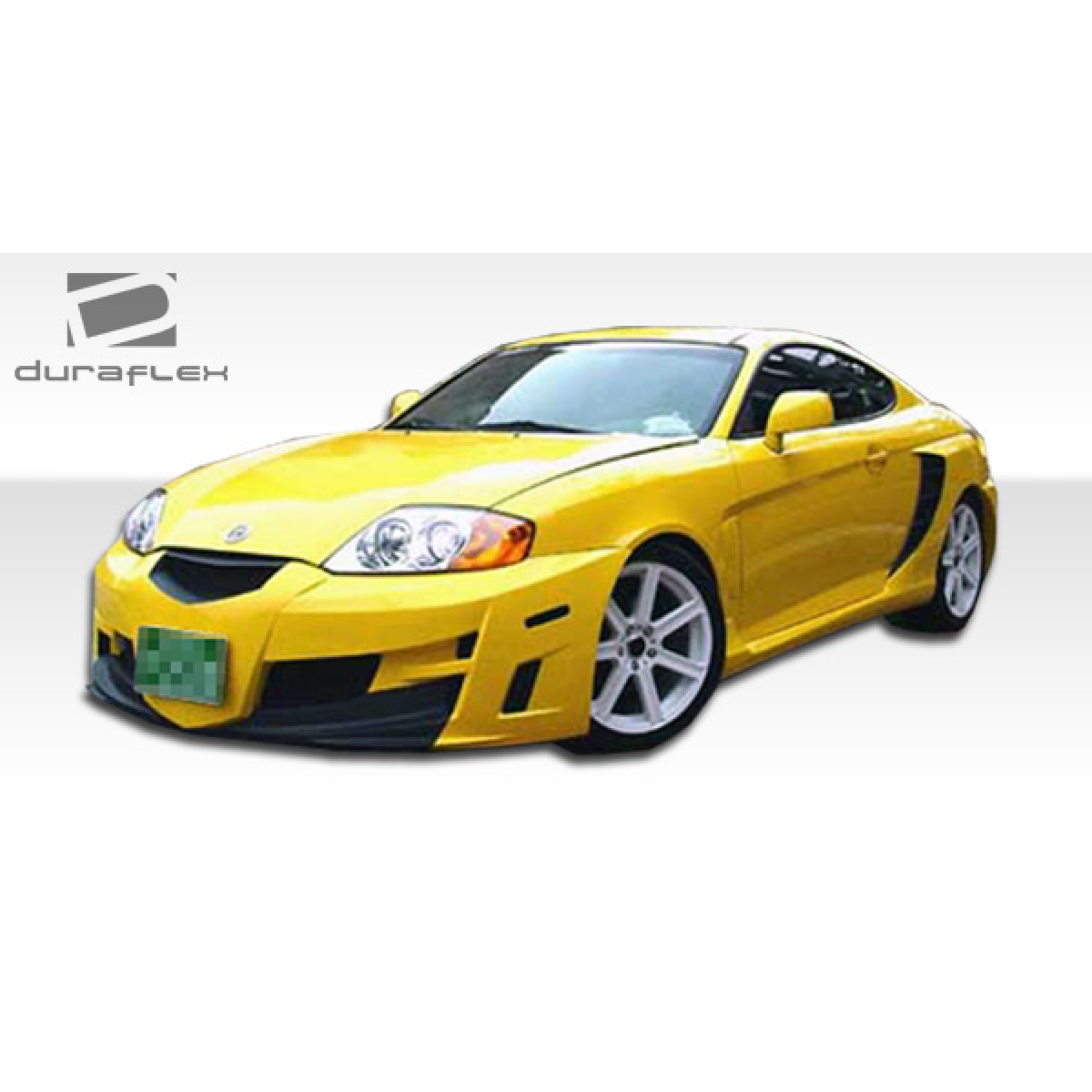 Modify your Hyundai Tiburon 2003 with our Exterior/Side Skirts - Front three quarter angle view of the vehicle