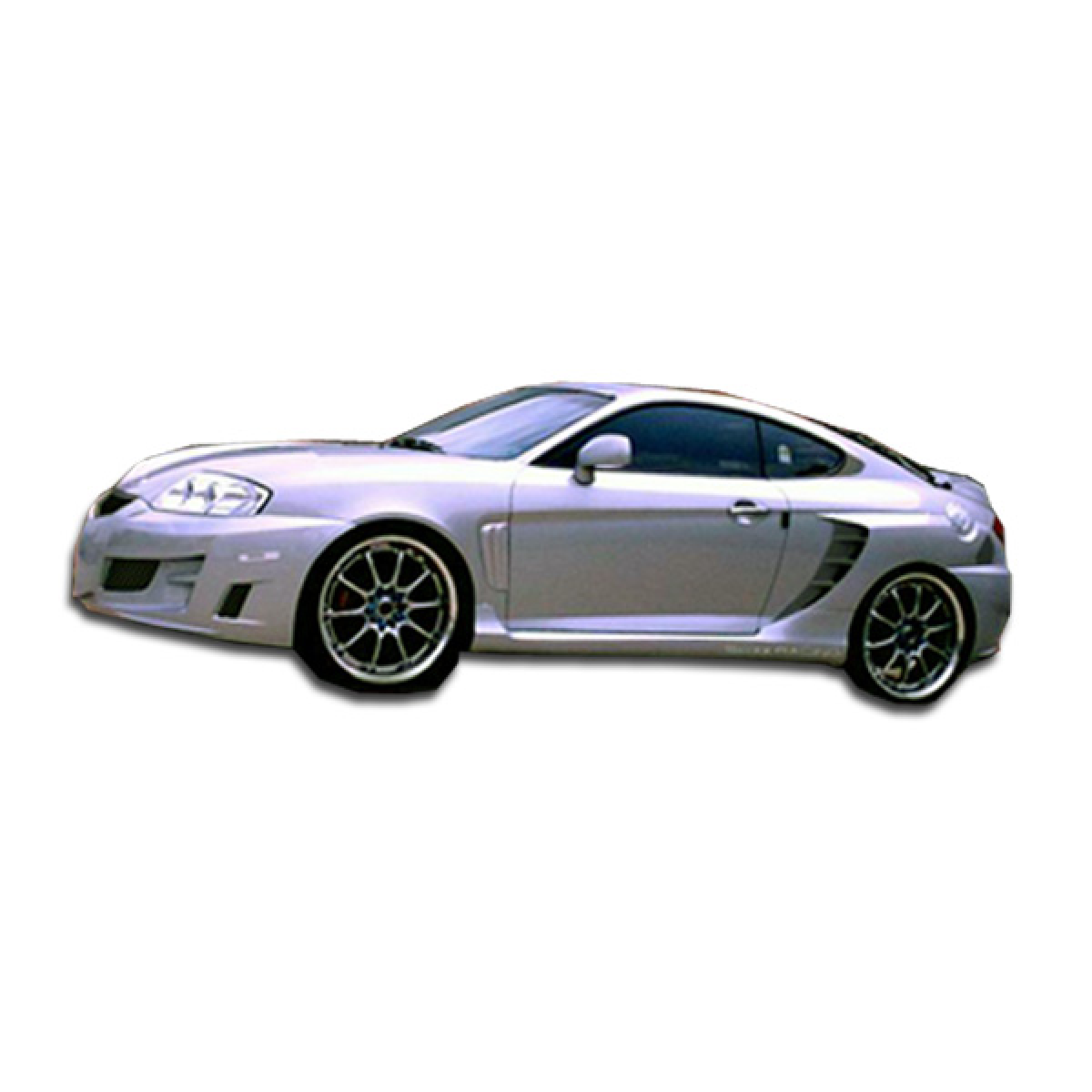 Modify your Hyundai Tiburon 2003 with our Exterior/Side Skirts - Side view of the vehicle at a slightly angled perspective