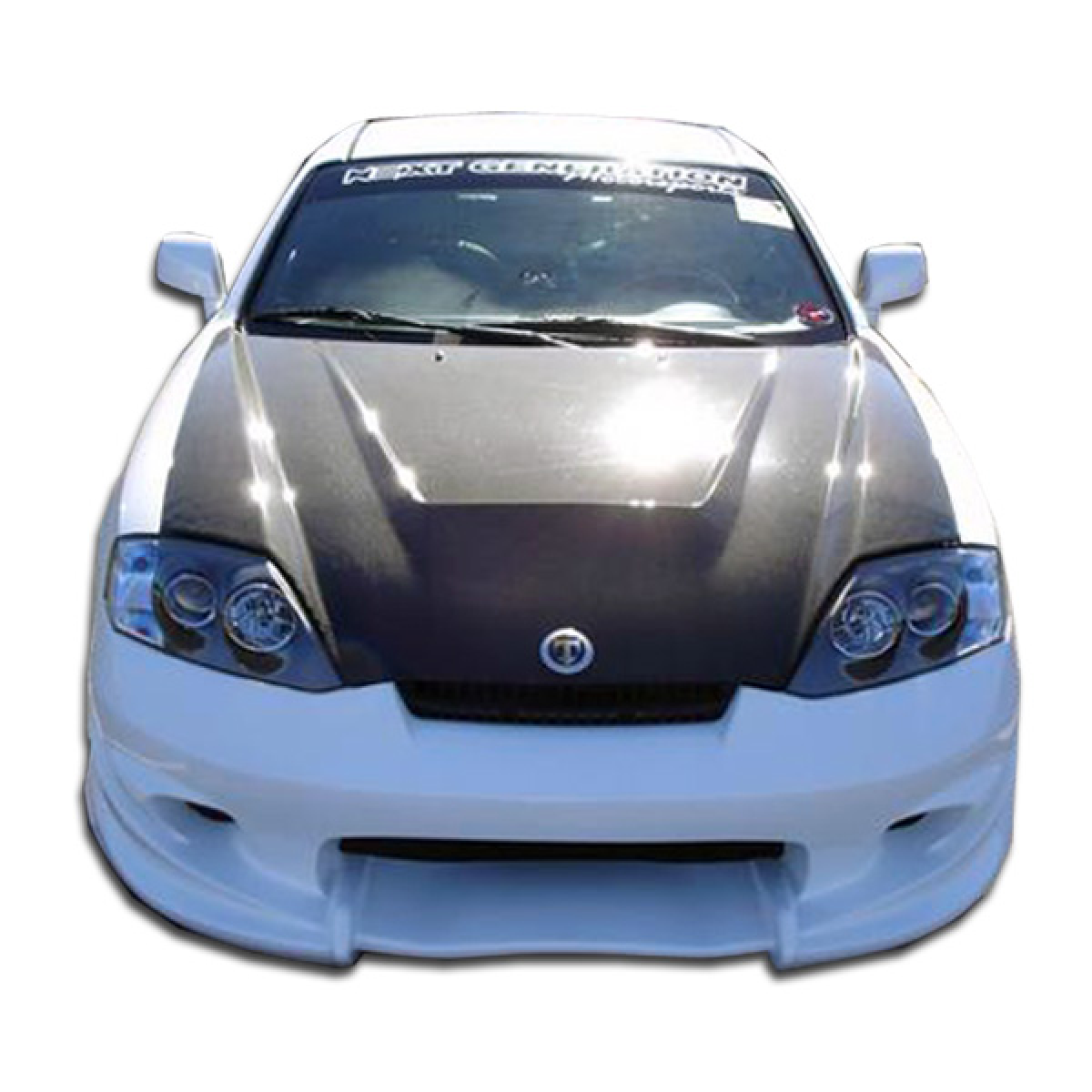 Modify your Hyundai Tiburon 2003 with our Exterior/Front Bumpers or Lips - Front view of vehicle at eye level angle