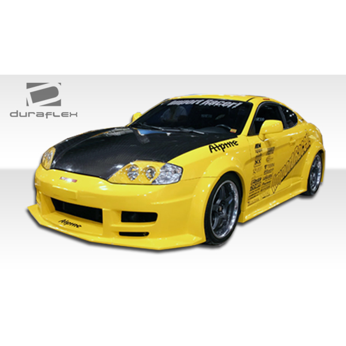 Modify your Hyundai Tiburon 2003 with our Exterior/Front Bumpers or Lips - Front angle view of a customized yellow tiburon